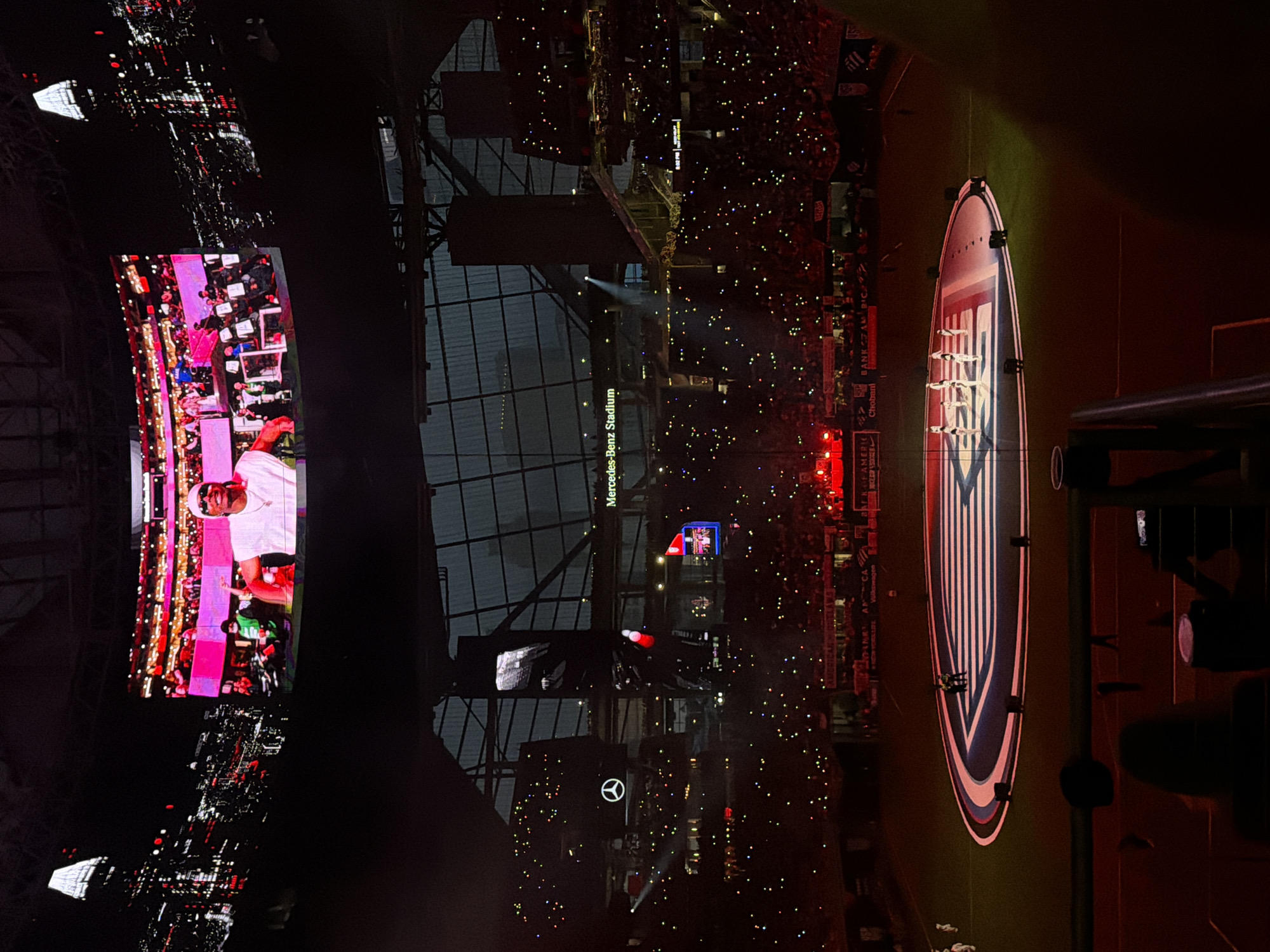 Crowd with lights fills Mercedes-Benz Stadium in Atlanta