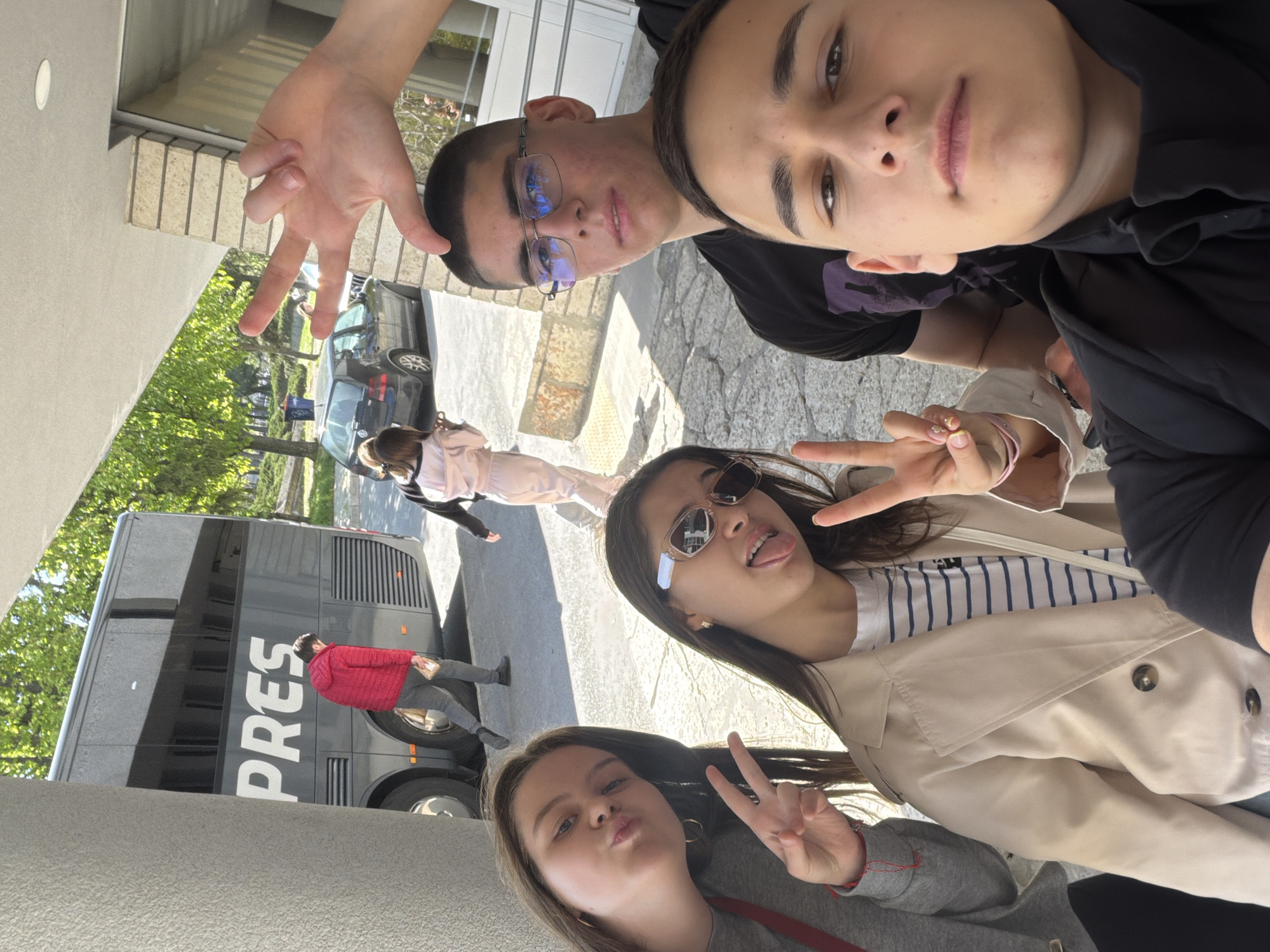 Friends pose for photos near bus in Shumen