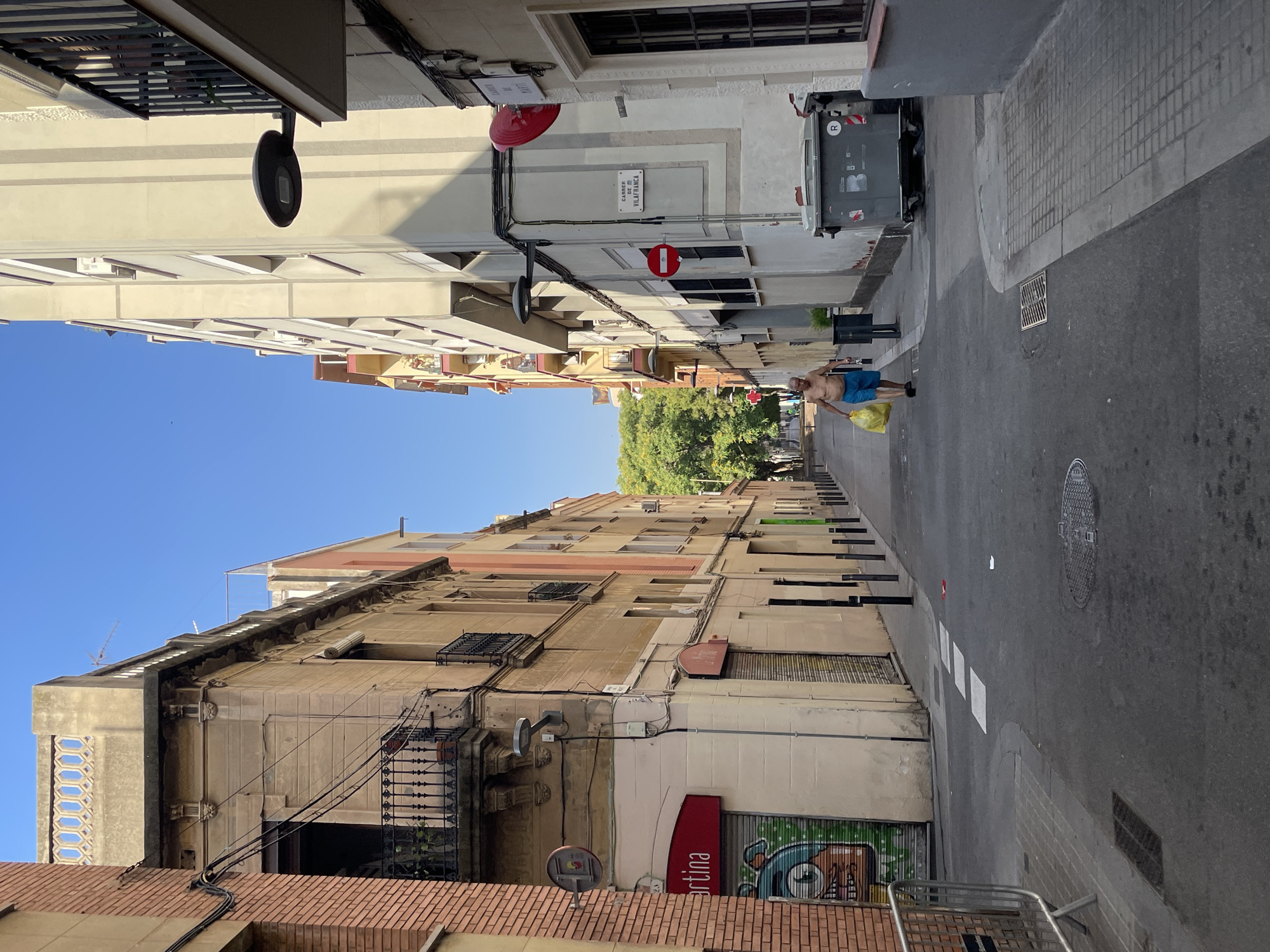 Barcelona street textures and neighborhood details on a sunny morning