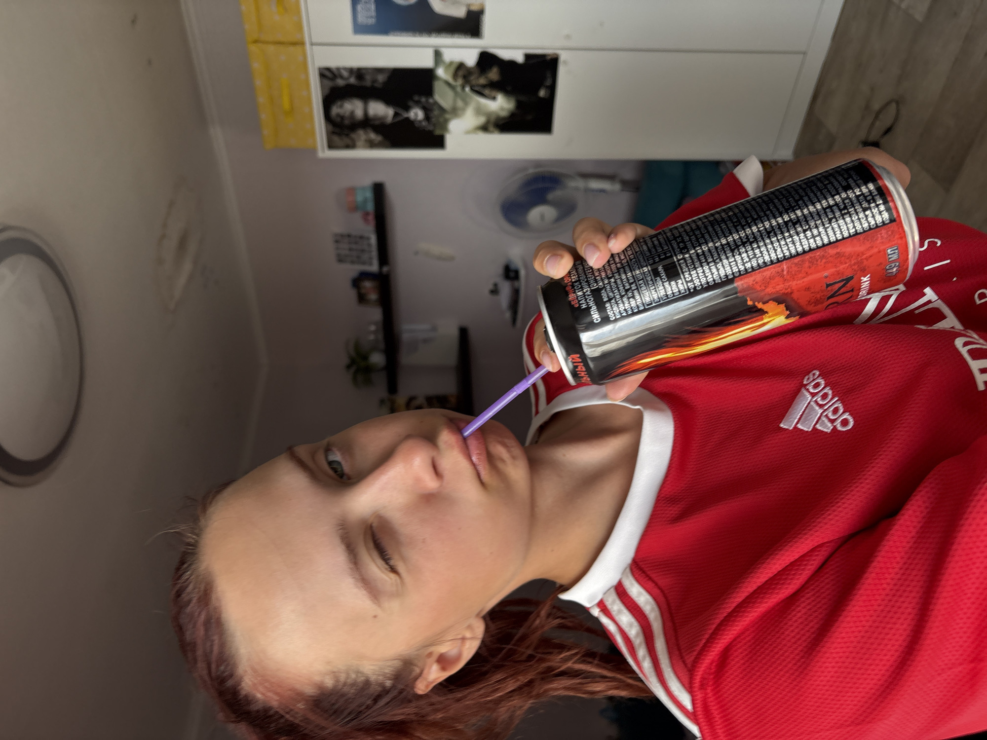 Person drinks BURN energy drink in Прикамский, Russia