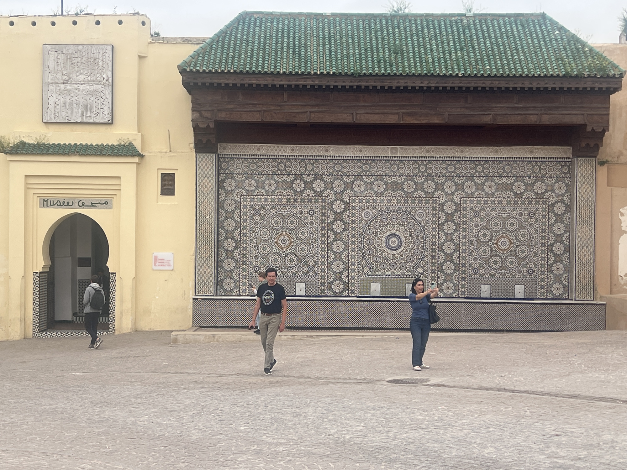 Street scenes documented in Meknes, Morocco under cloudy skies