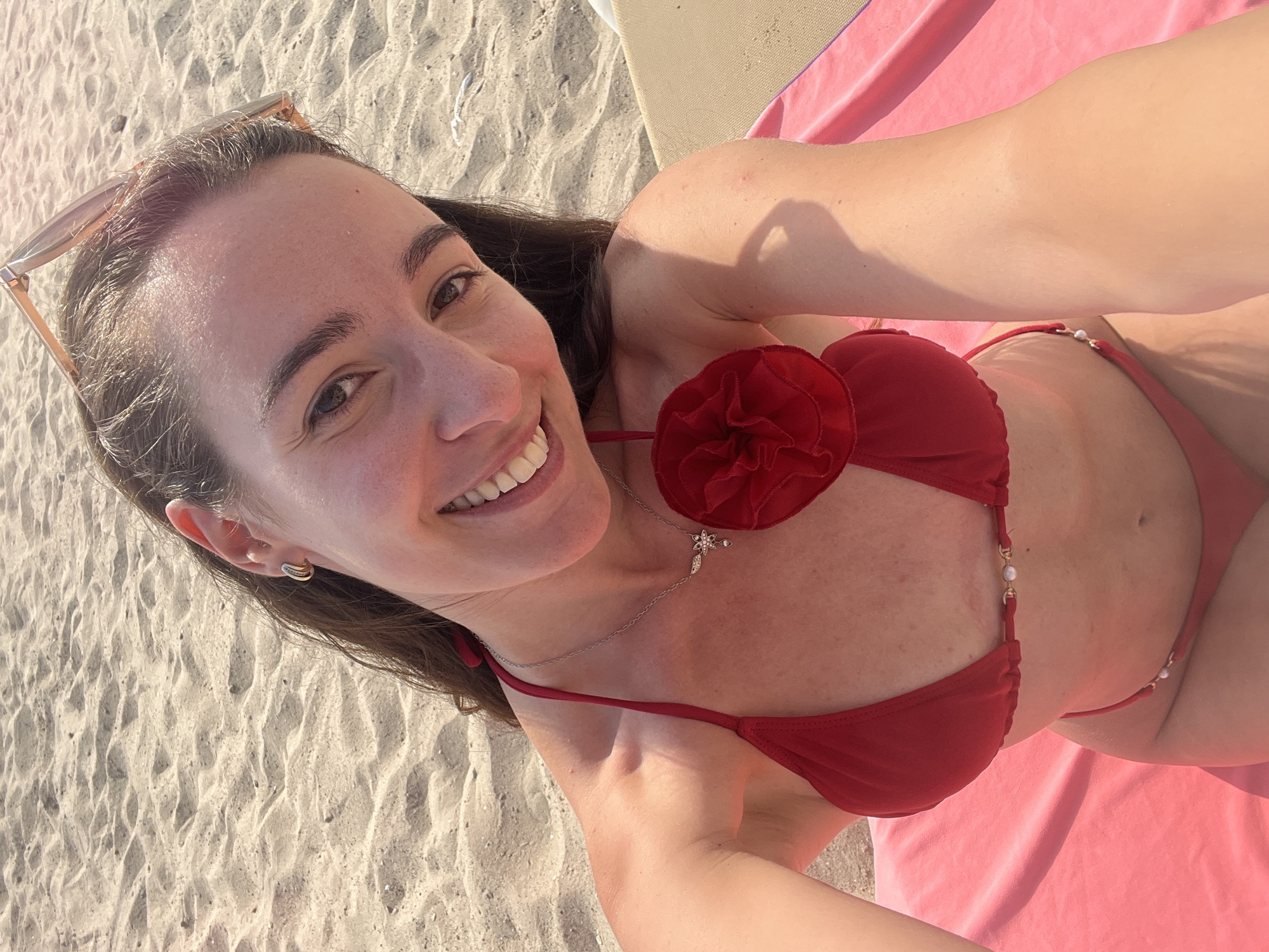 Woman enjoys beach reading session in Alicante