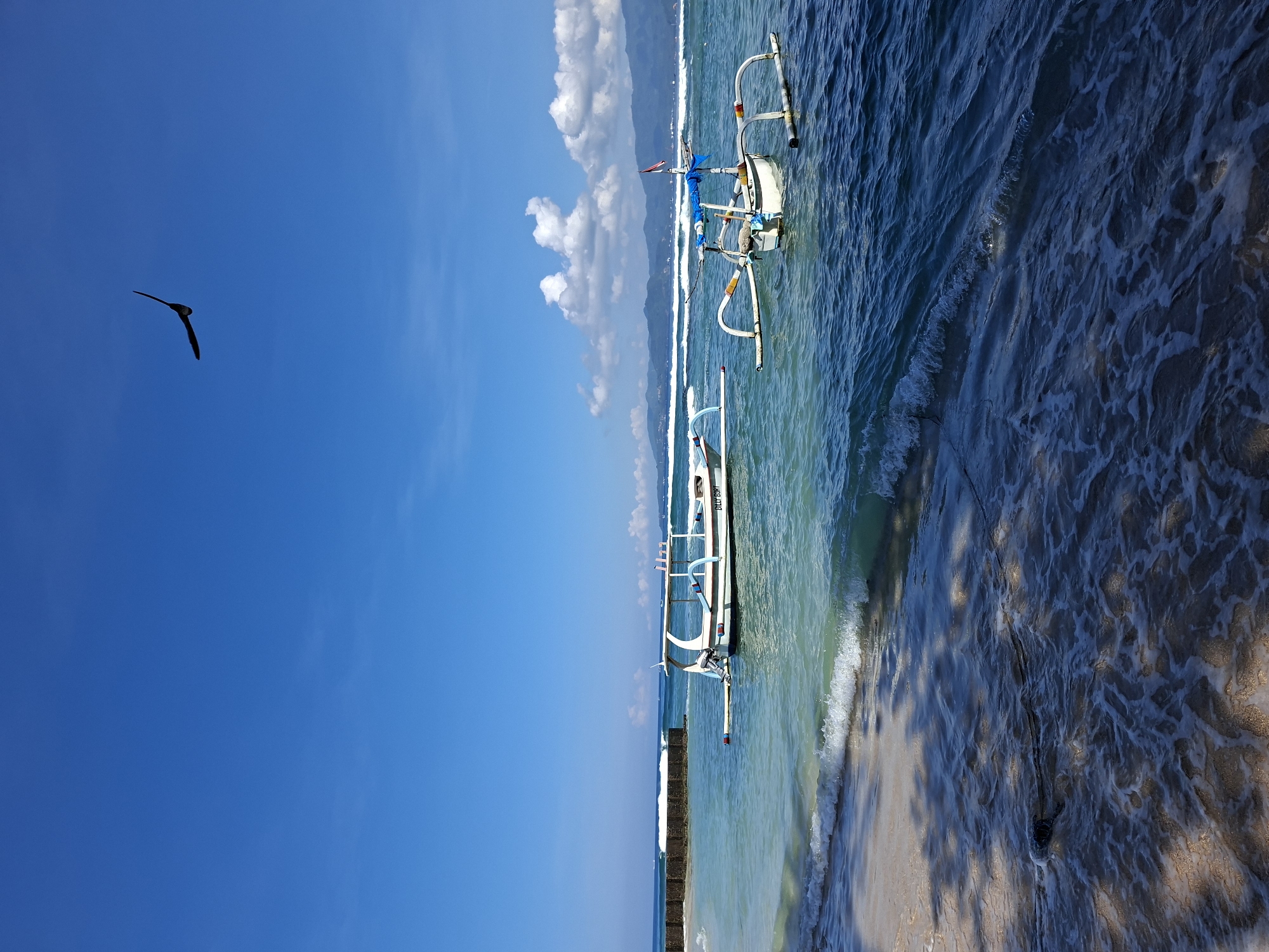 Witness captures coastal views in Karangasem, Indonesia beachfront scene
