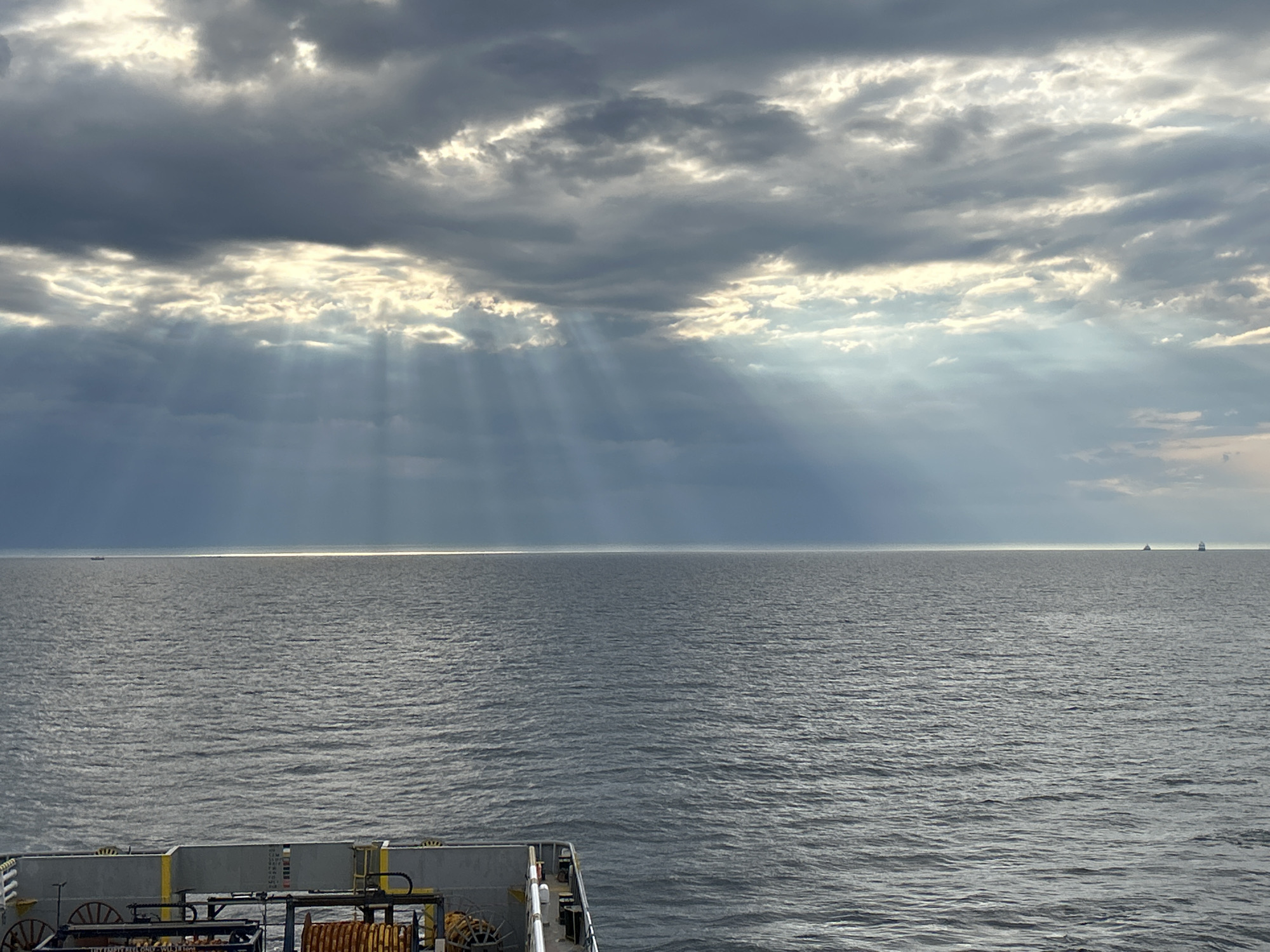 Dramatic clouds captured over Baltic waters from ship bow