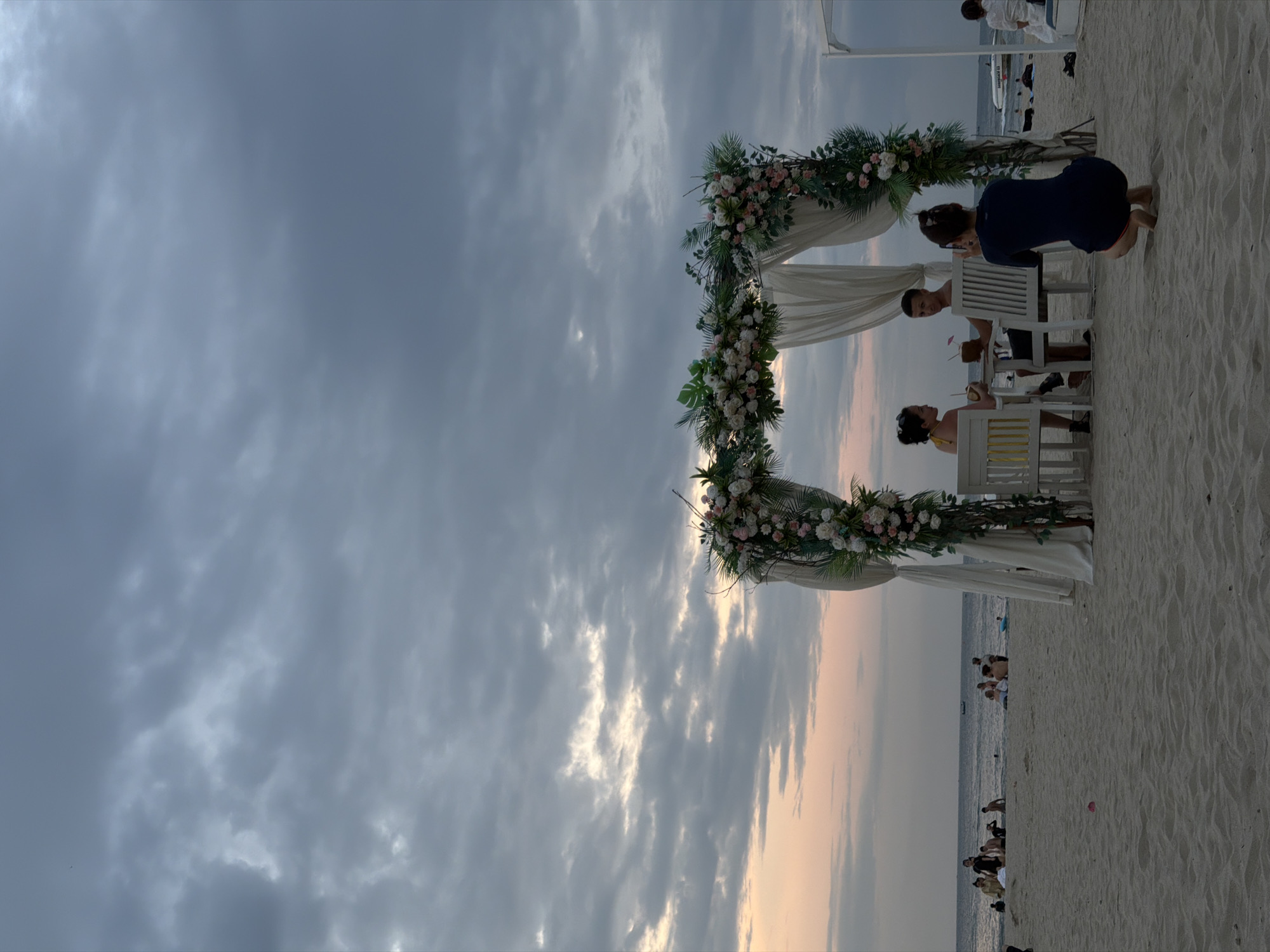 Busy evening at My Khe Beach under a stormy Đà Nẵng sky