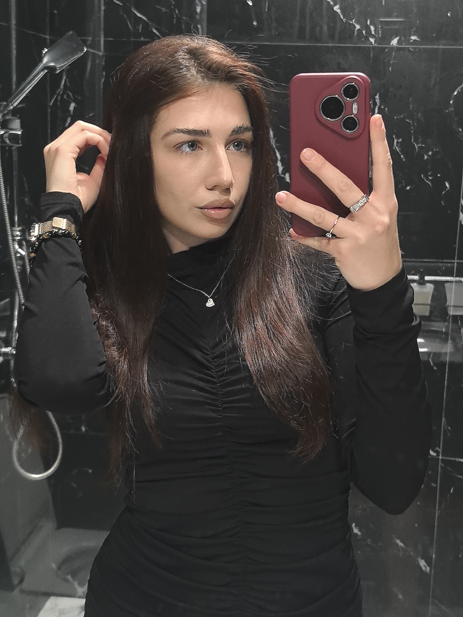 Woman takes bathroom selfies in Velingrad, Bulgaria
