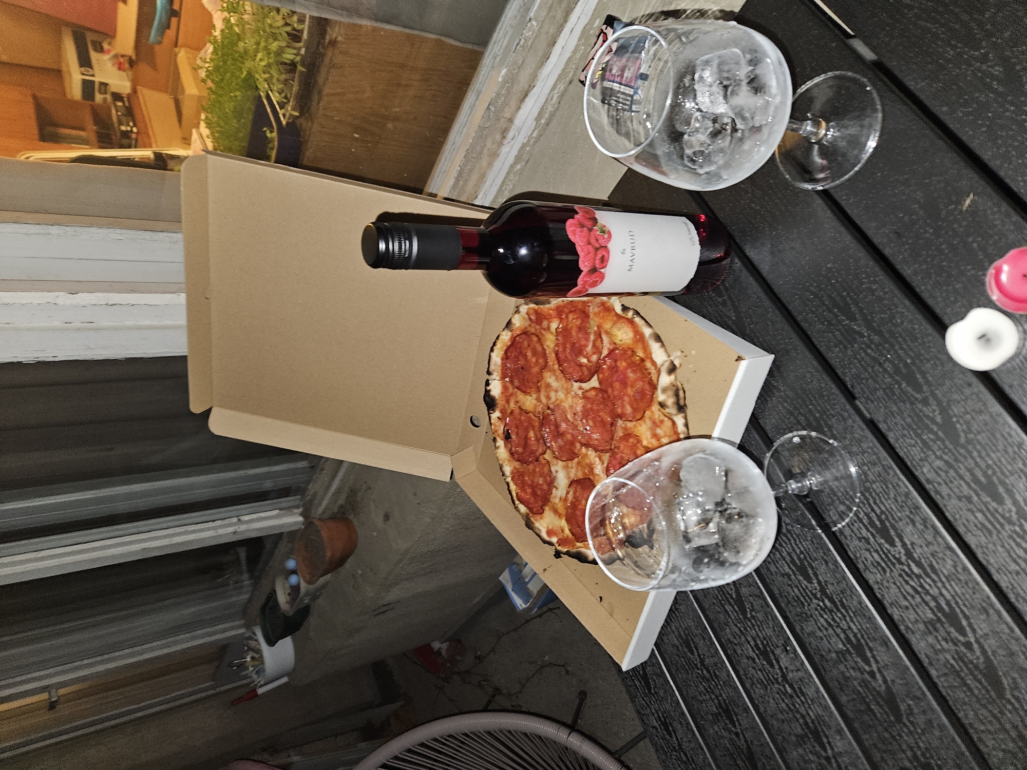 Outdoor pizza and wine dining captured in Sofia