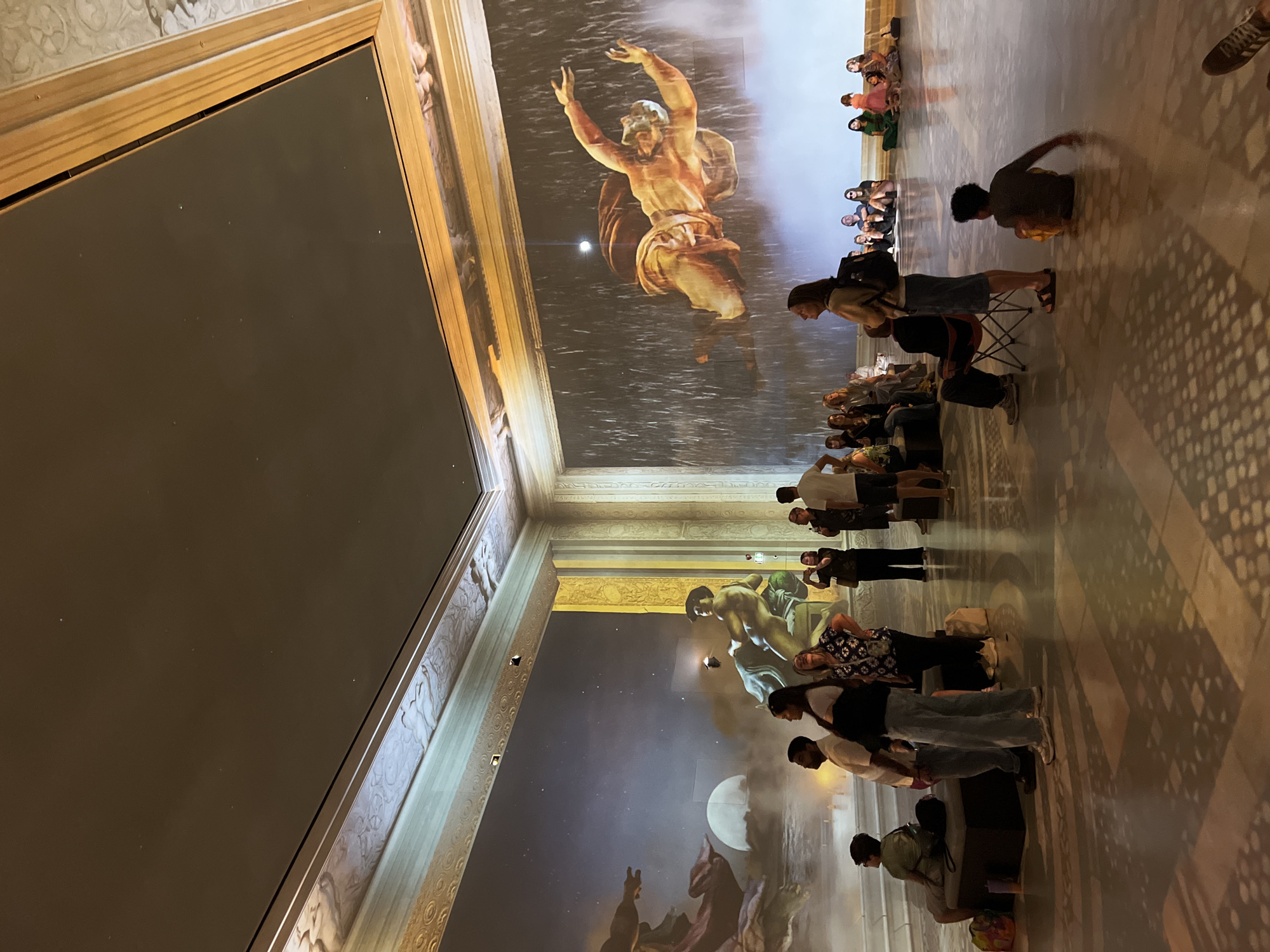 Large-scale immersive art projections fill a London exhibition hall