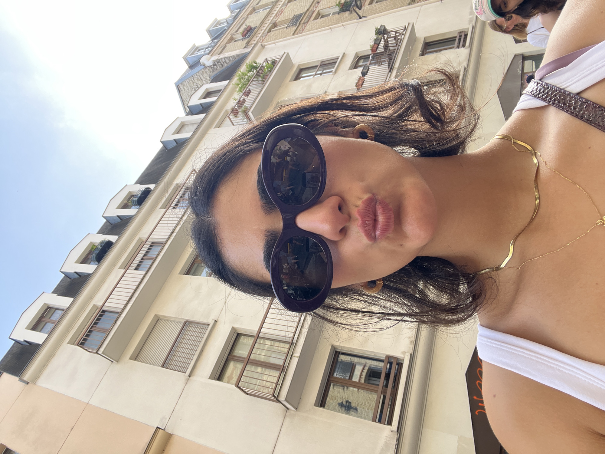 Paris street scenes include selfies and man on pavement