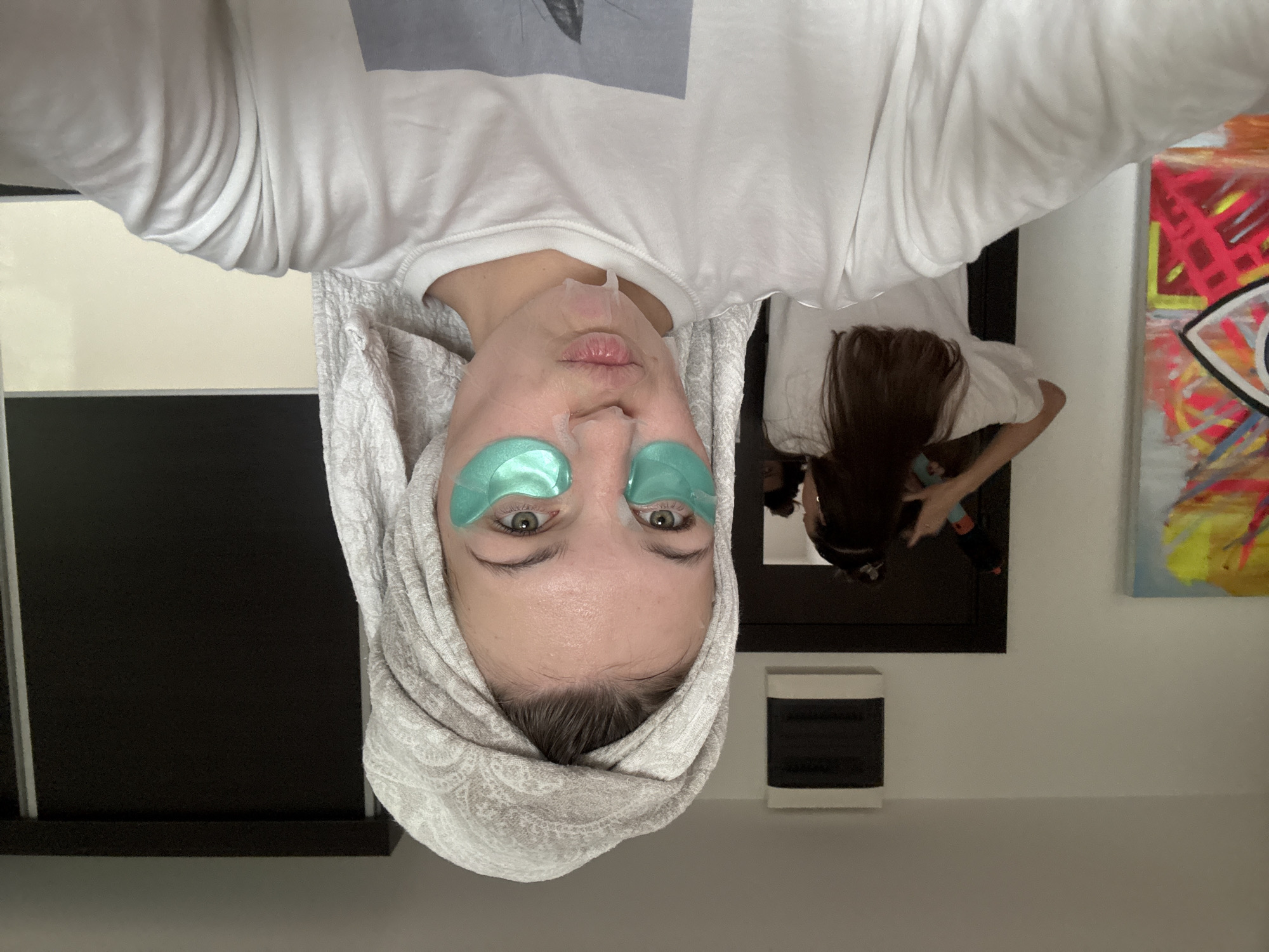 Woman applies facial masks during skincare routine in Belgrade