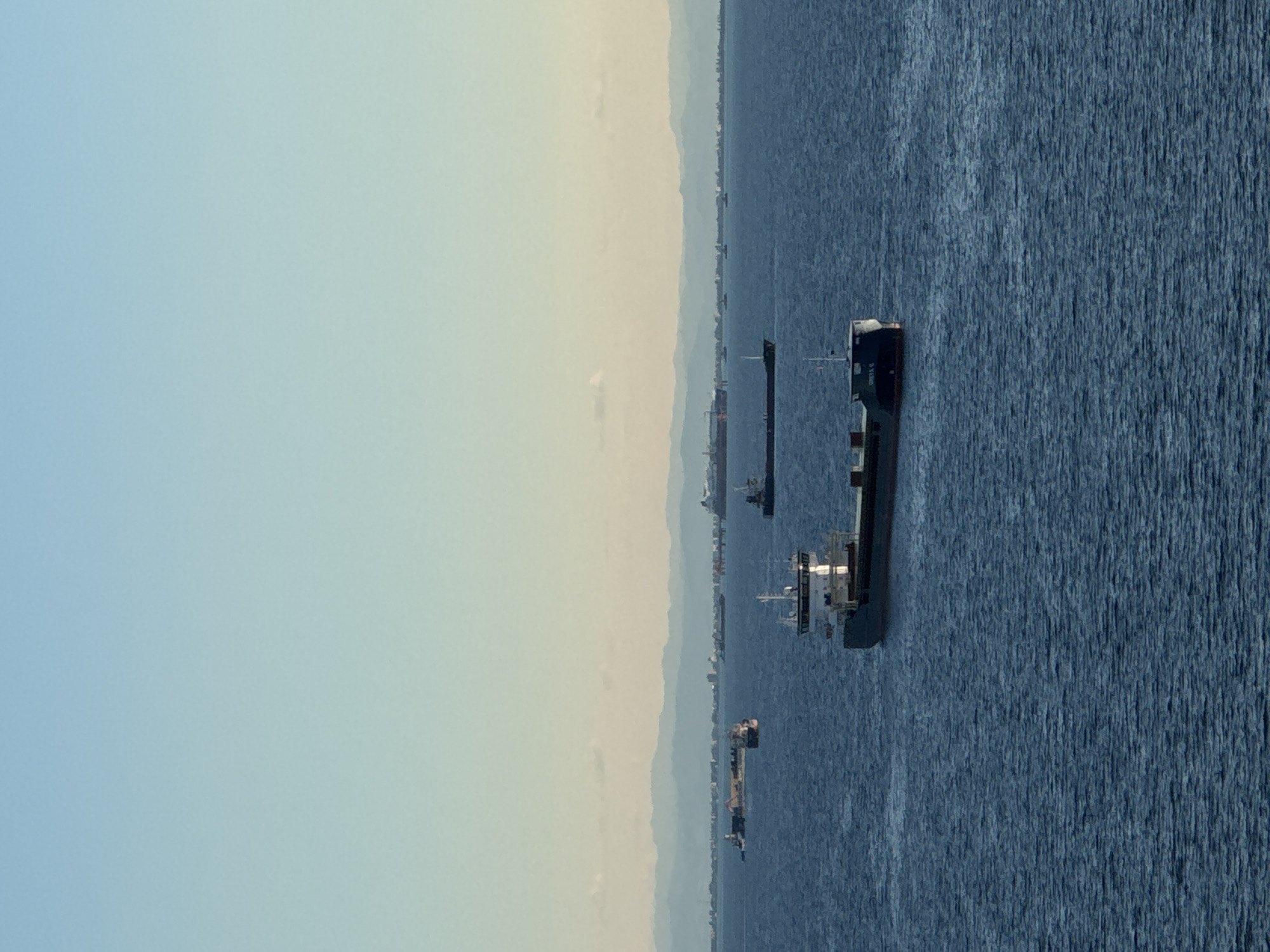 Maritime activity documented off Italian coast including oil rig