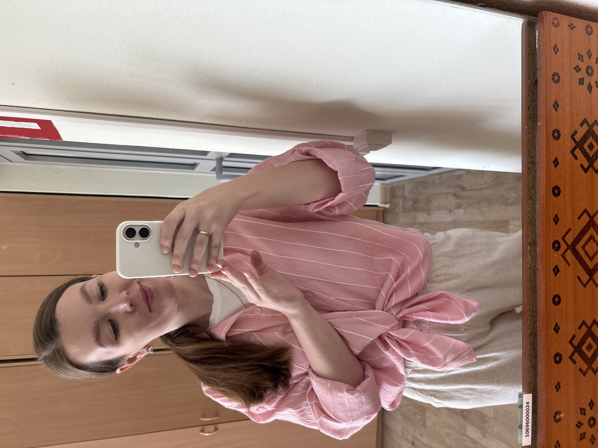 Woman documents selfie session in mirrors across Izhevsk
