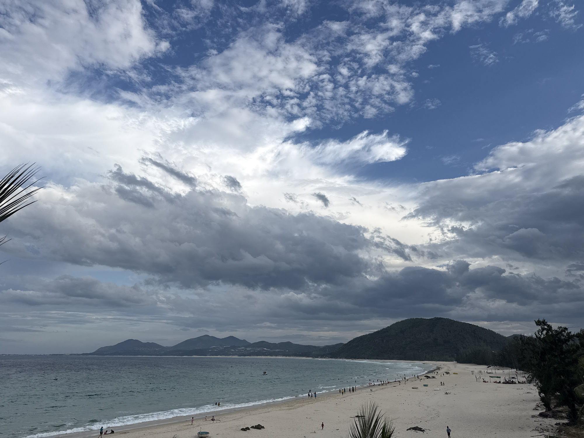 Stormy skies and calm water on a tropical coast