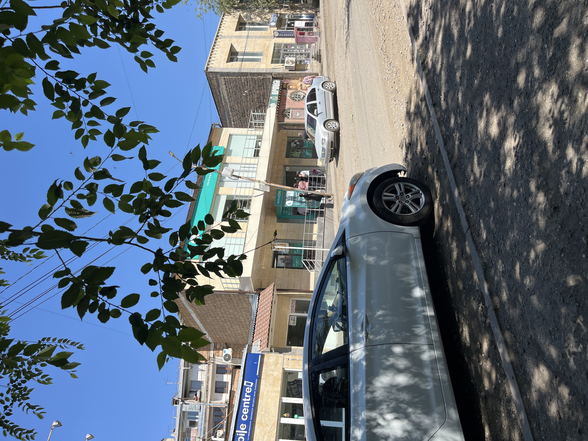 Quiet roads and parked vehicles in rural Armenia