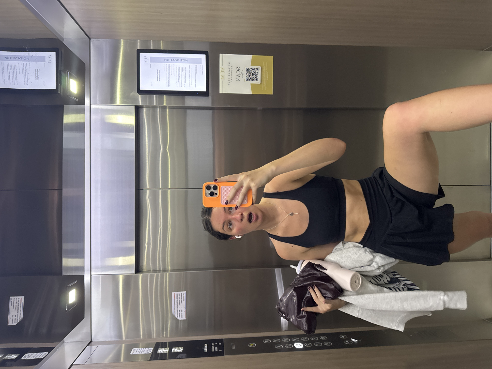 Woman takes gym selfie in Dubai elevator