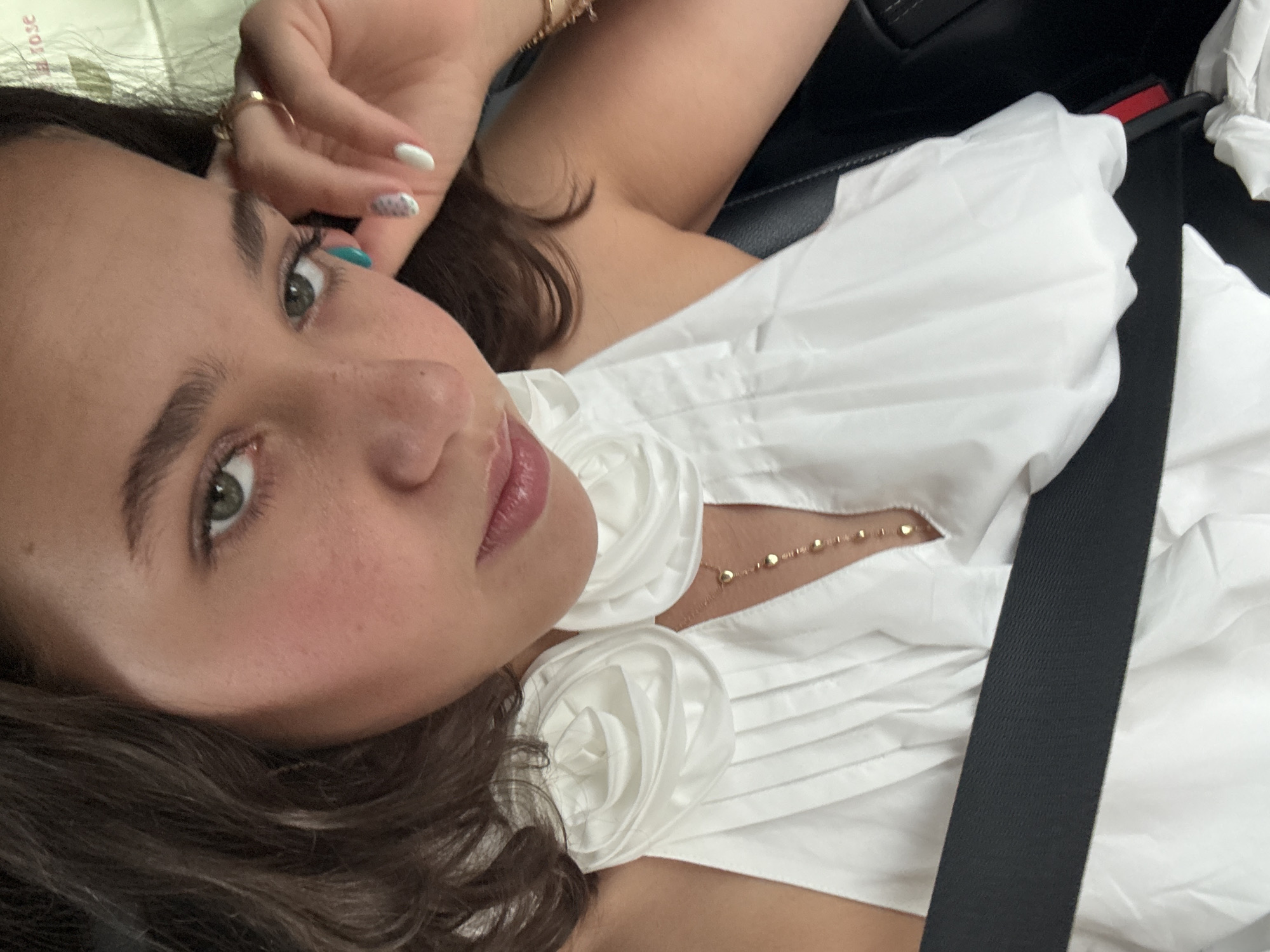 Inside a car in Milan, floral dress and street views