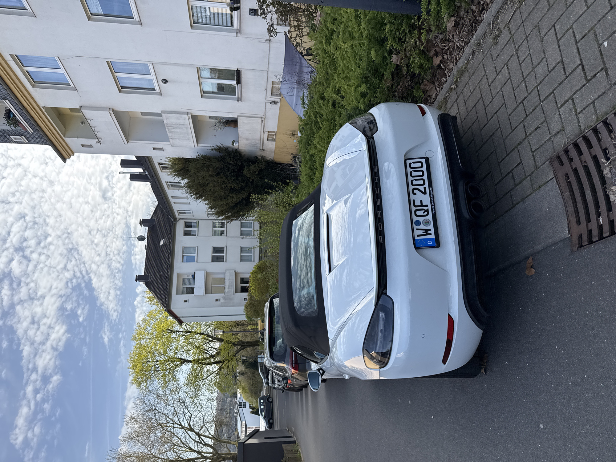 Porsche illegally parked on Wuppertal sidewalk