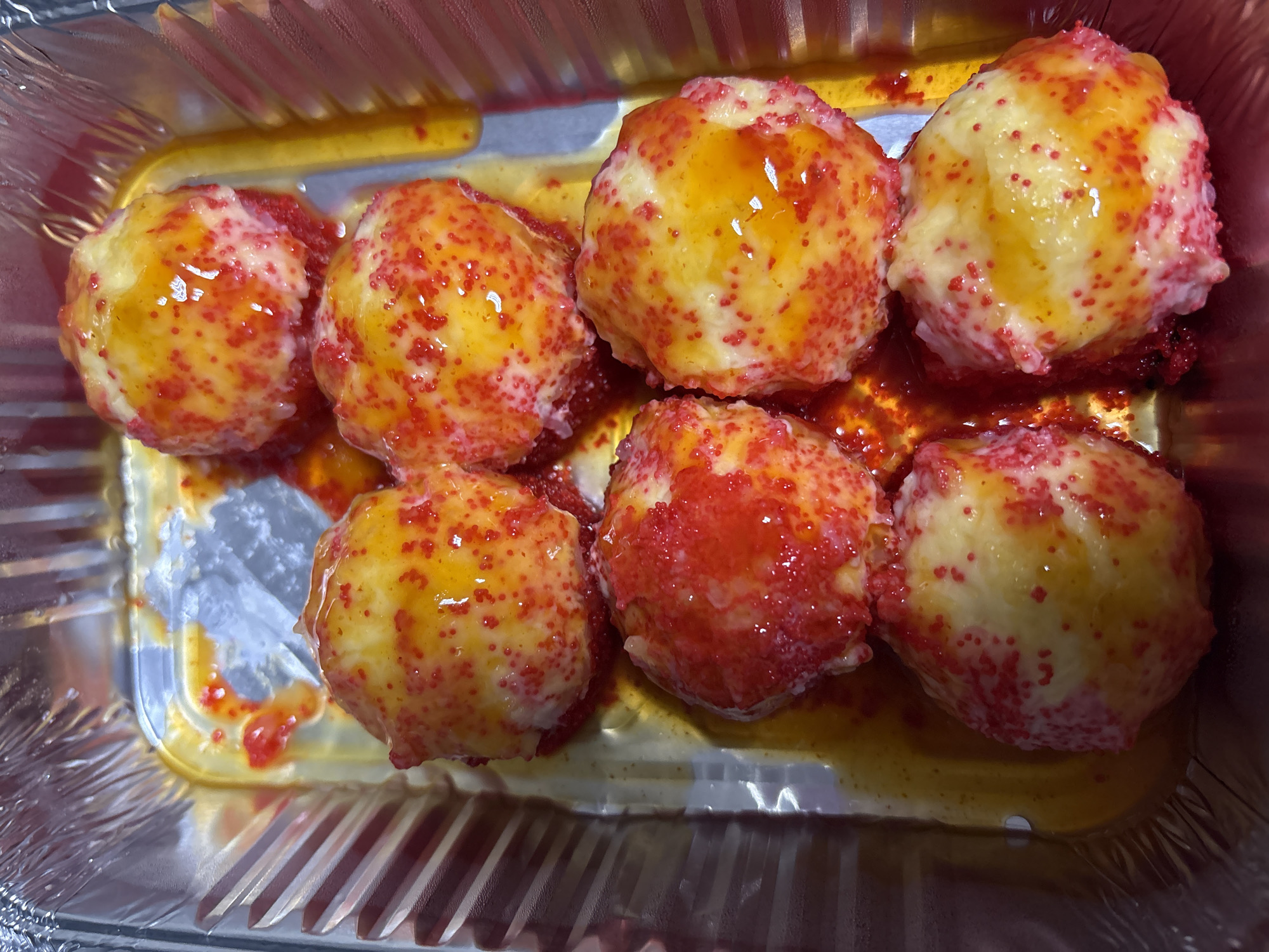 Glazed baked goods spotted in foil container in Ust-Ilimsk