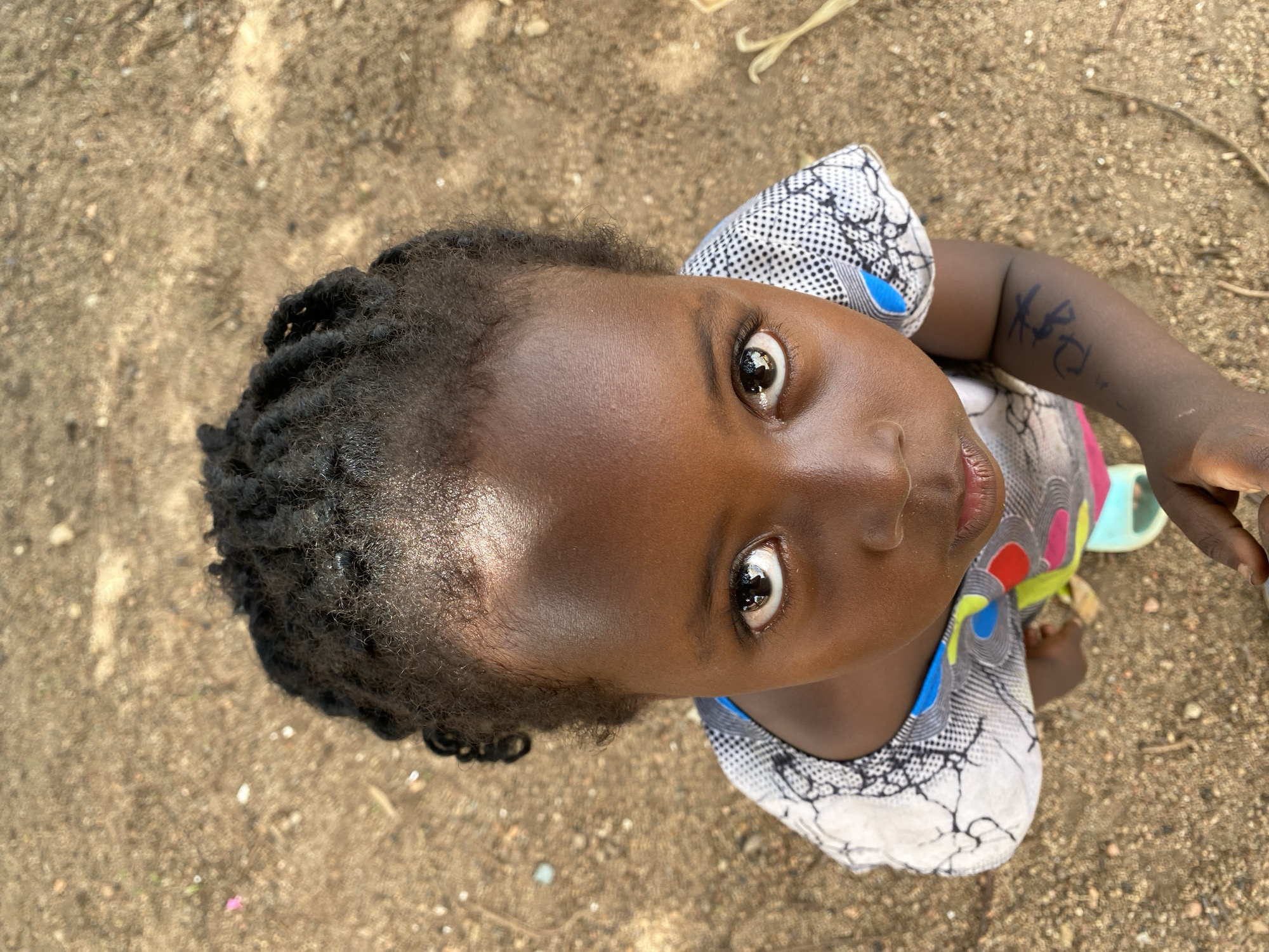 Child photographed in multiple shots in Kuru Dungus, Nigeria