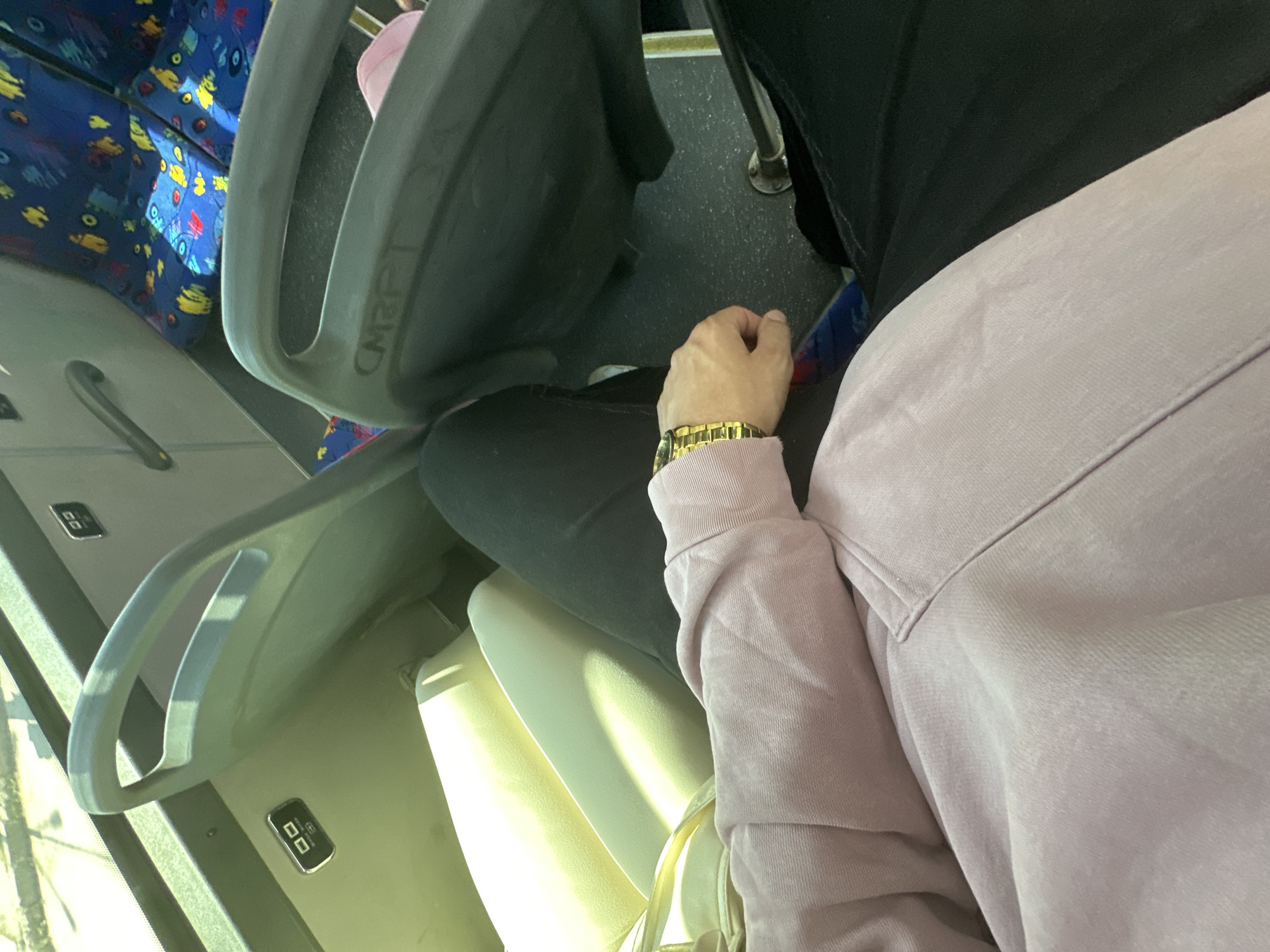 Bus passenger in lavender top observed in Sofia