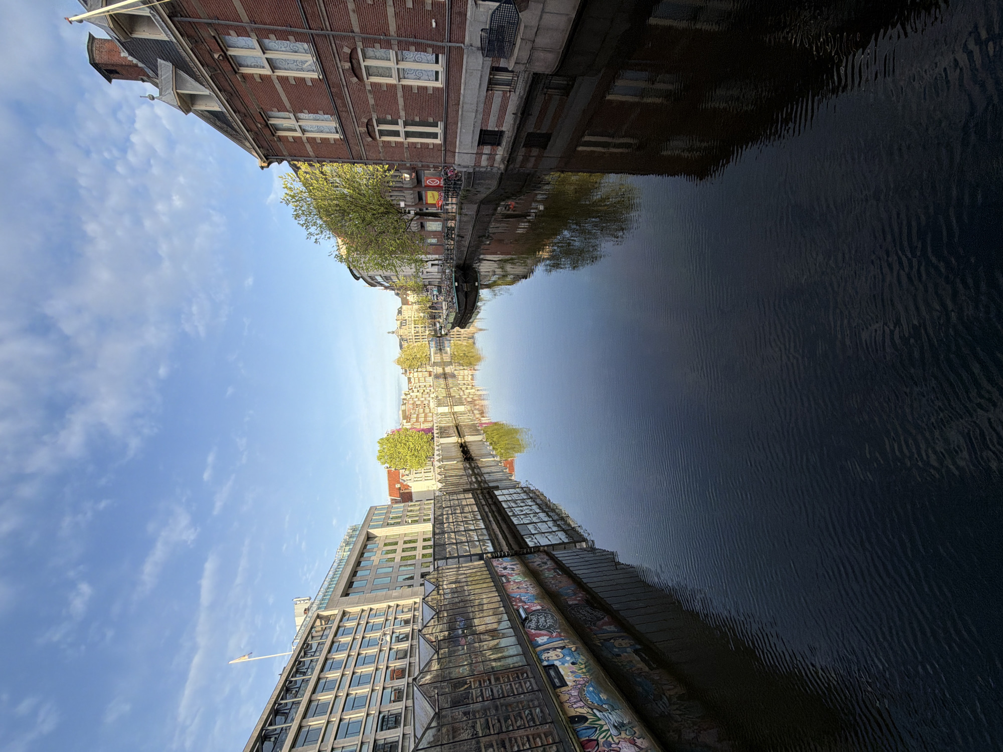 Morning scenes of Amsterdam canals and historic architecture documented