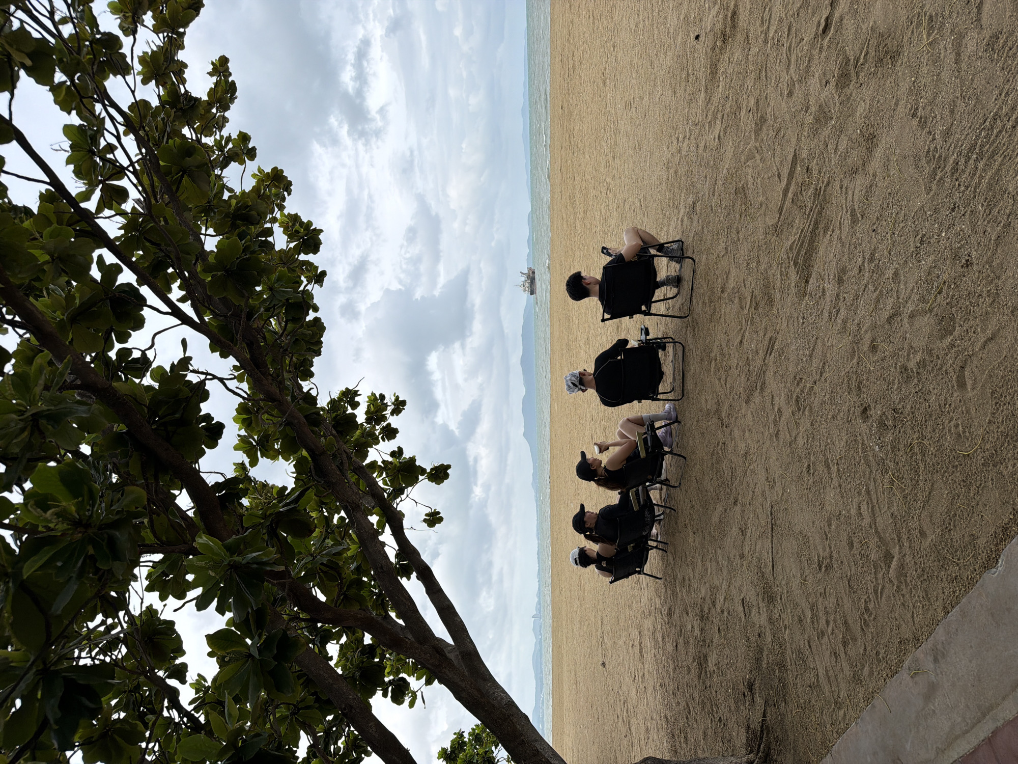 Overcast morning brings quiet beach life to Pattaya City
