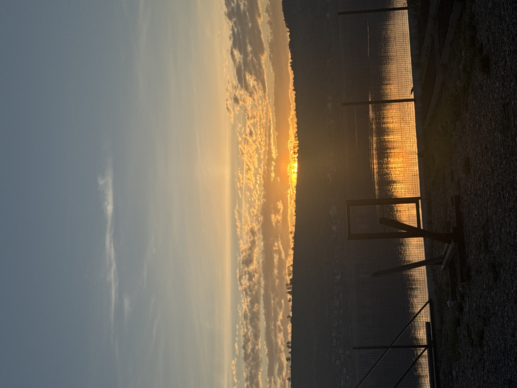 Sunset landscape with water reflection observed in Irkutsk