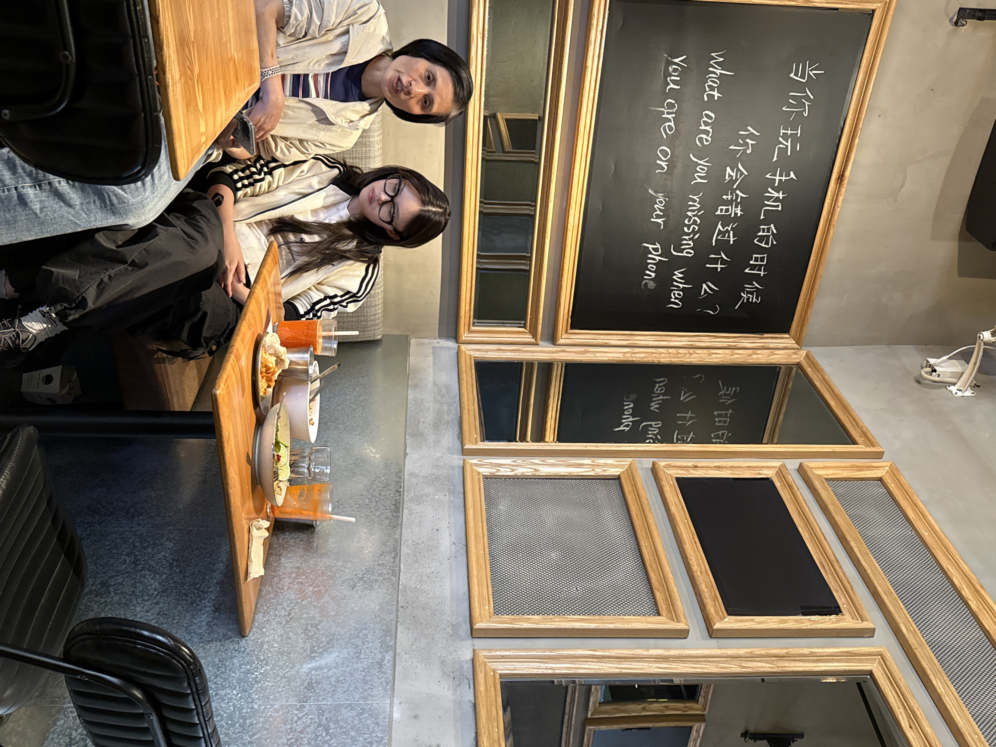 Women share green smoothies at early morning cafe in Yuzhong