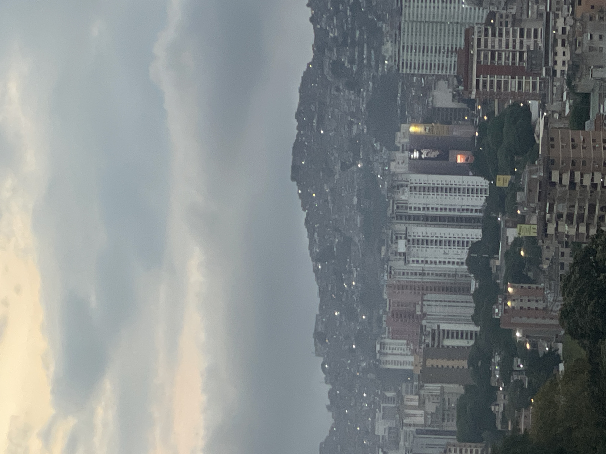 Evening scenes and laptop work documented in Caracas