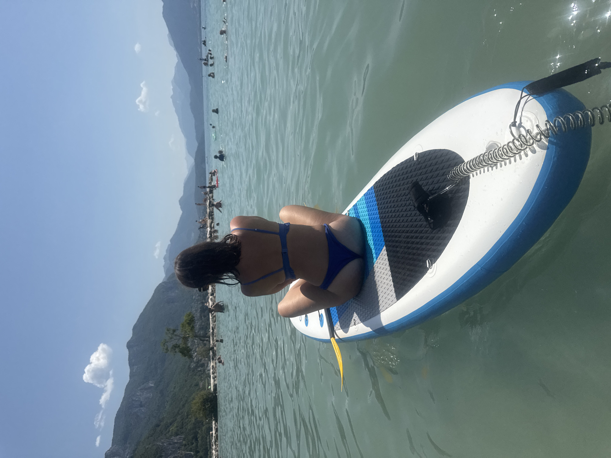 Paddleboard rest on an alpine lake near Annecy