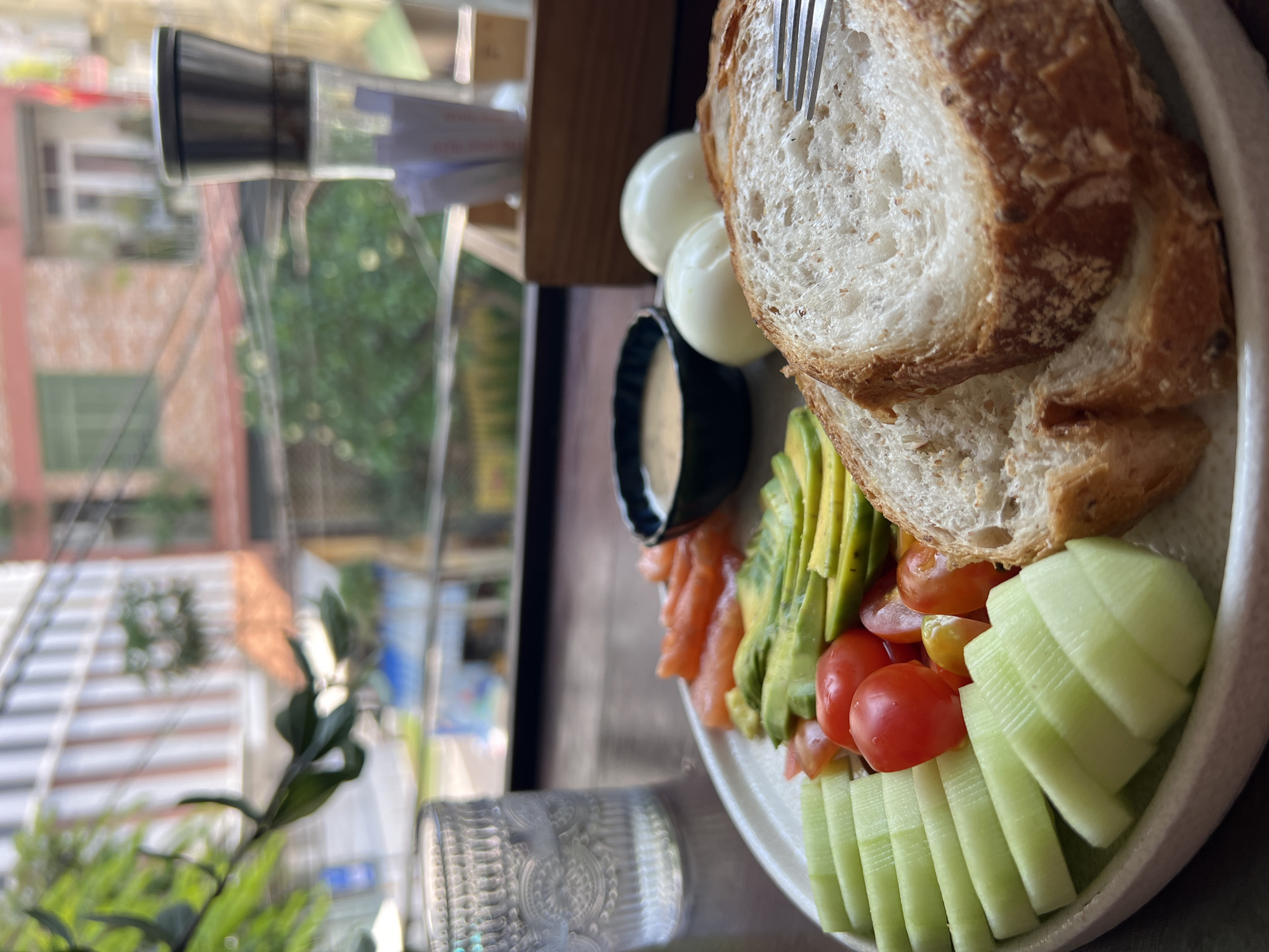 Morning breakfast photographed with city view in Nha Trang