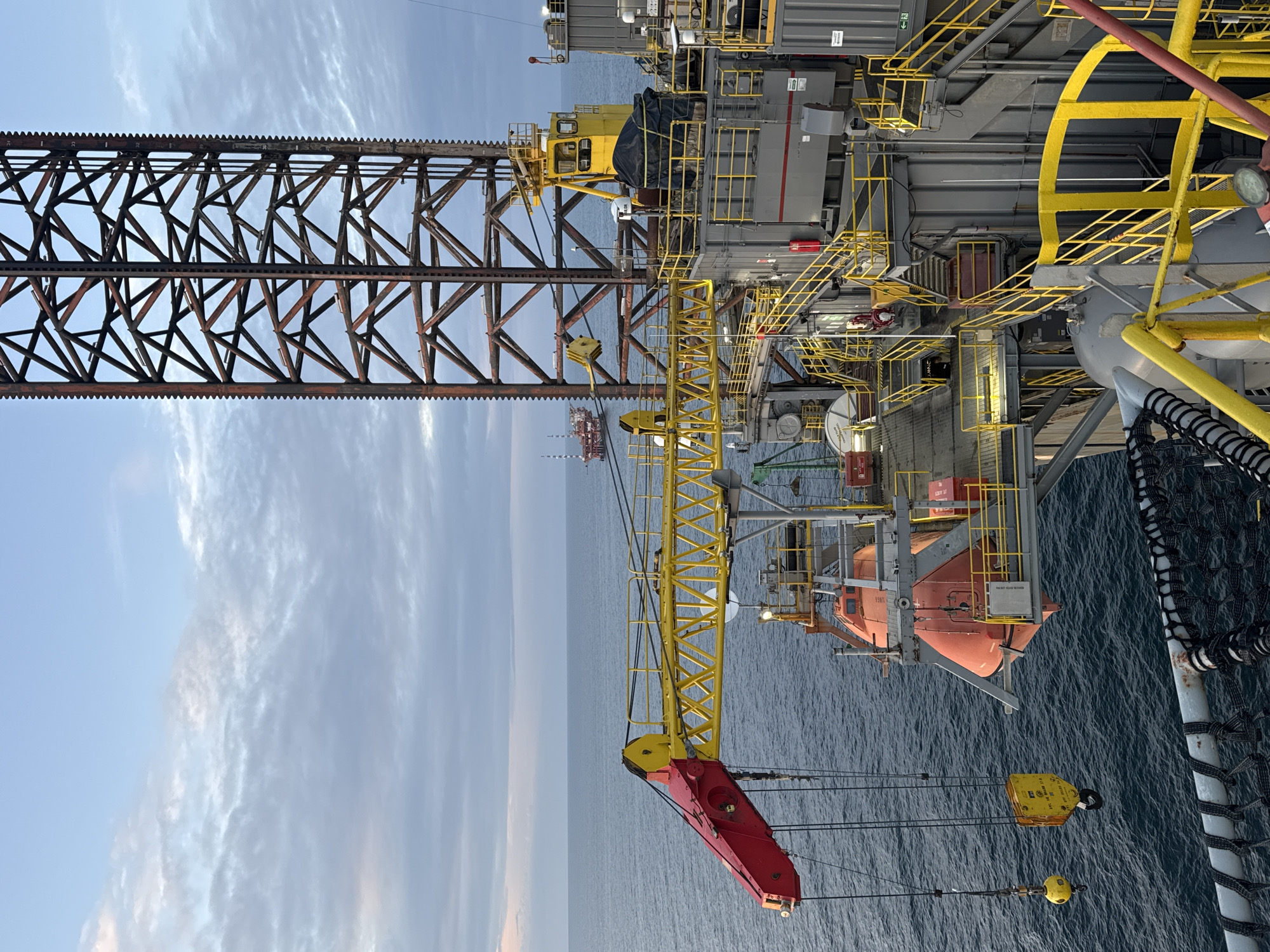 Evening offshore oil platform operations captured in Adriatic Sea