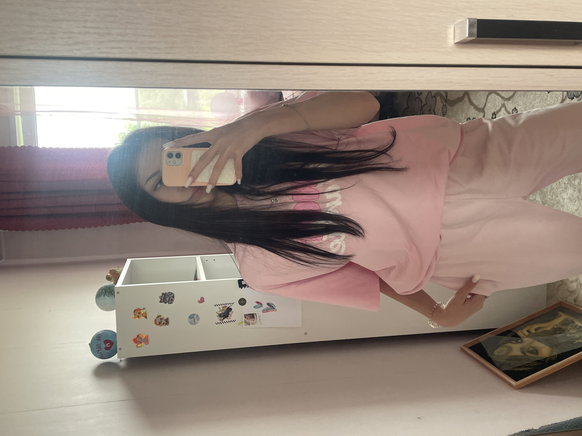 Woman documents morning routine through selfies in Медведево, Russia
