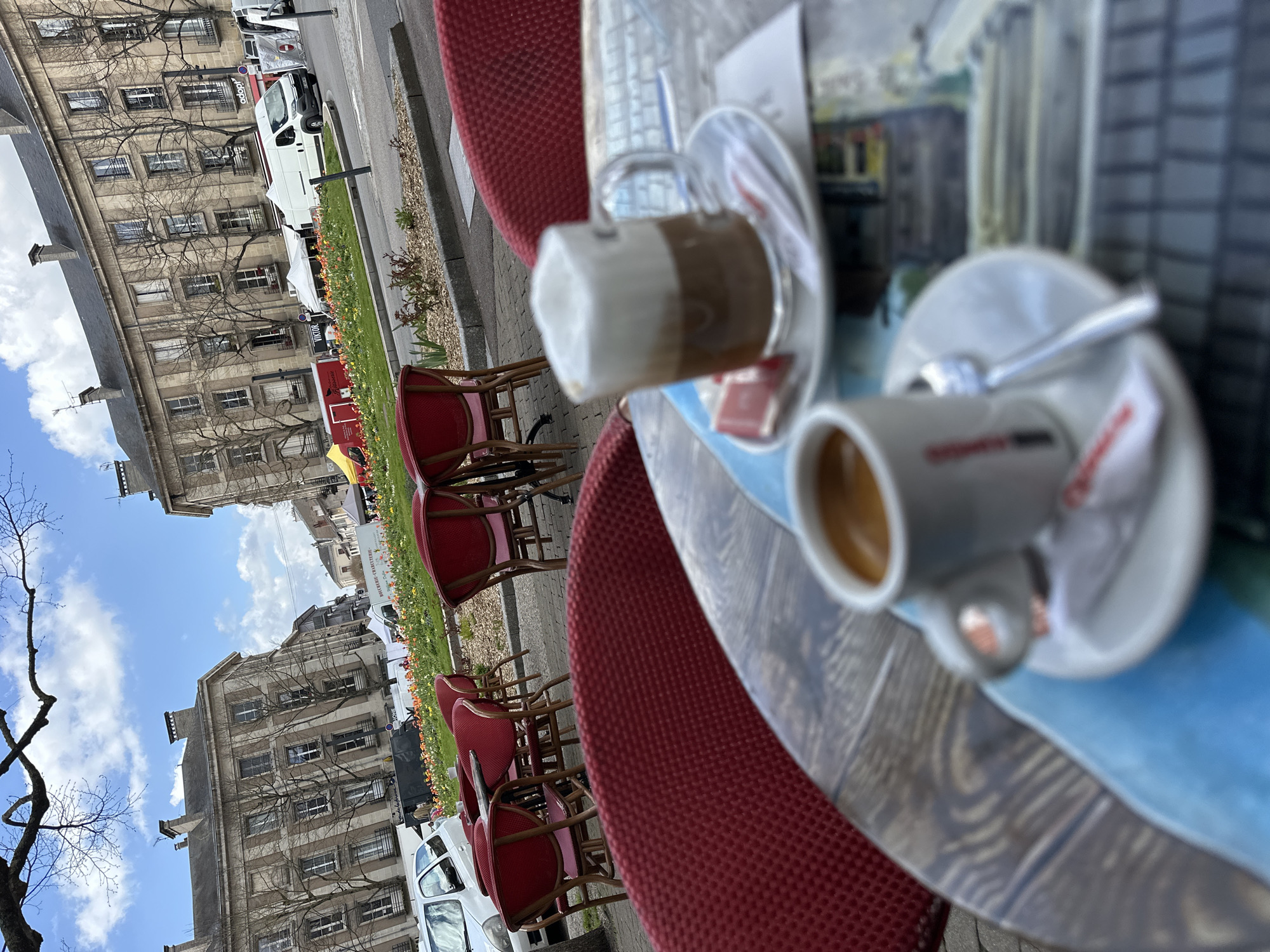 Morning coffee service at outdoor cafe in Toul, France