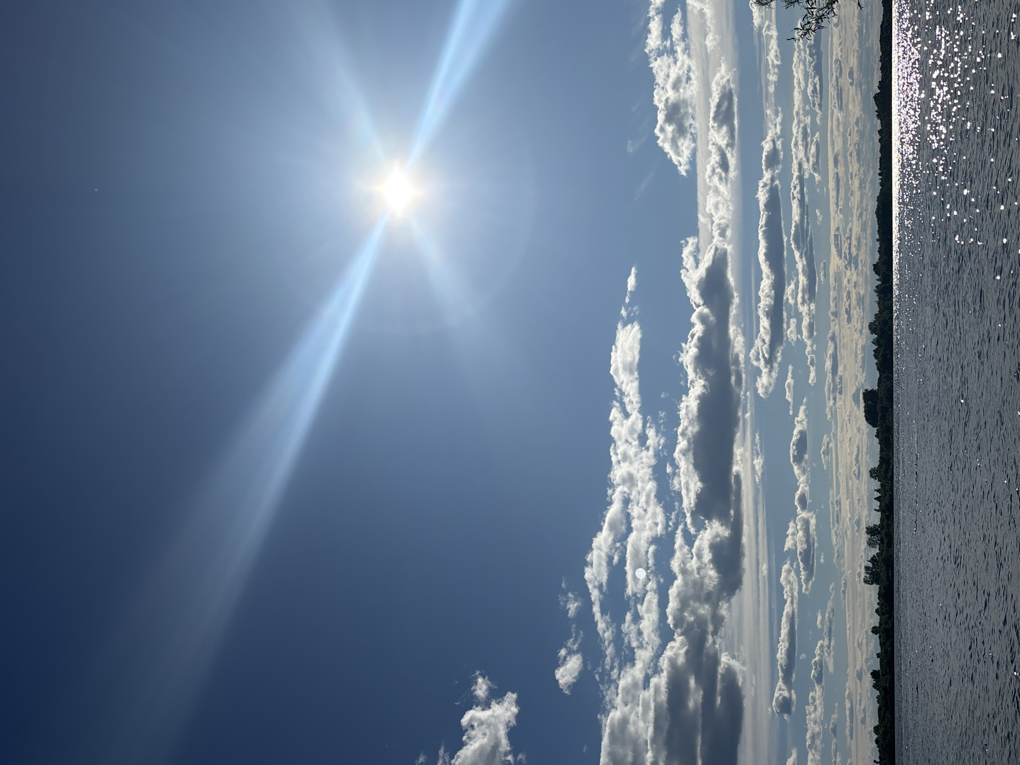 Bright summer sun over Arkhangelsk's open skies