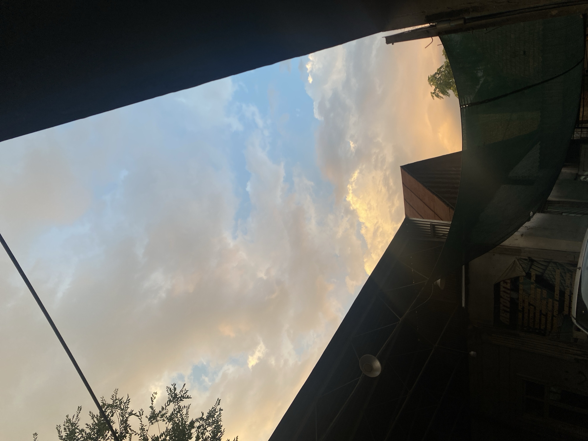 Sky gradient between structures, Bishkek afternoon light
