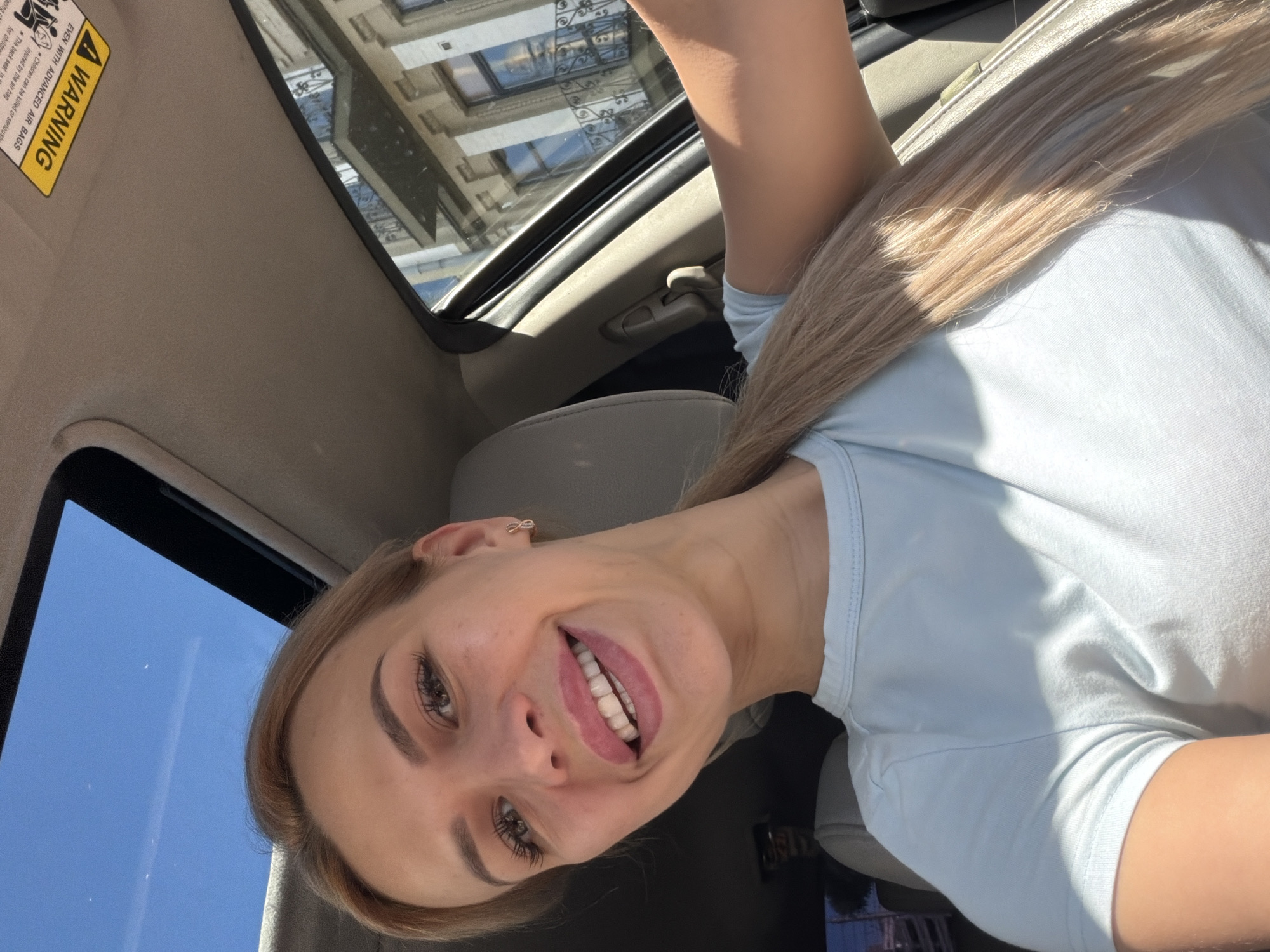 Sunroof selfies on a sunny Kyiv morning