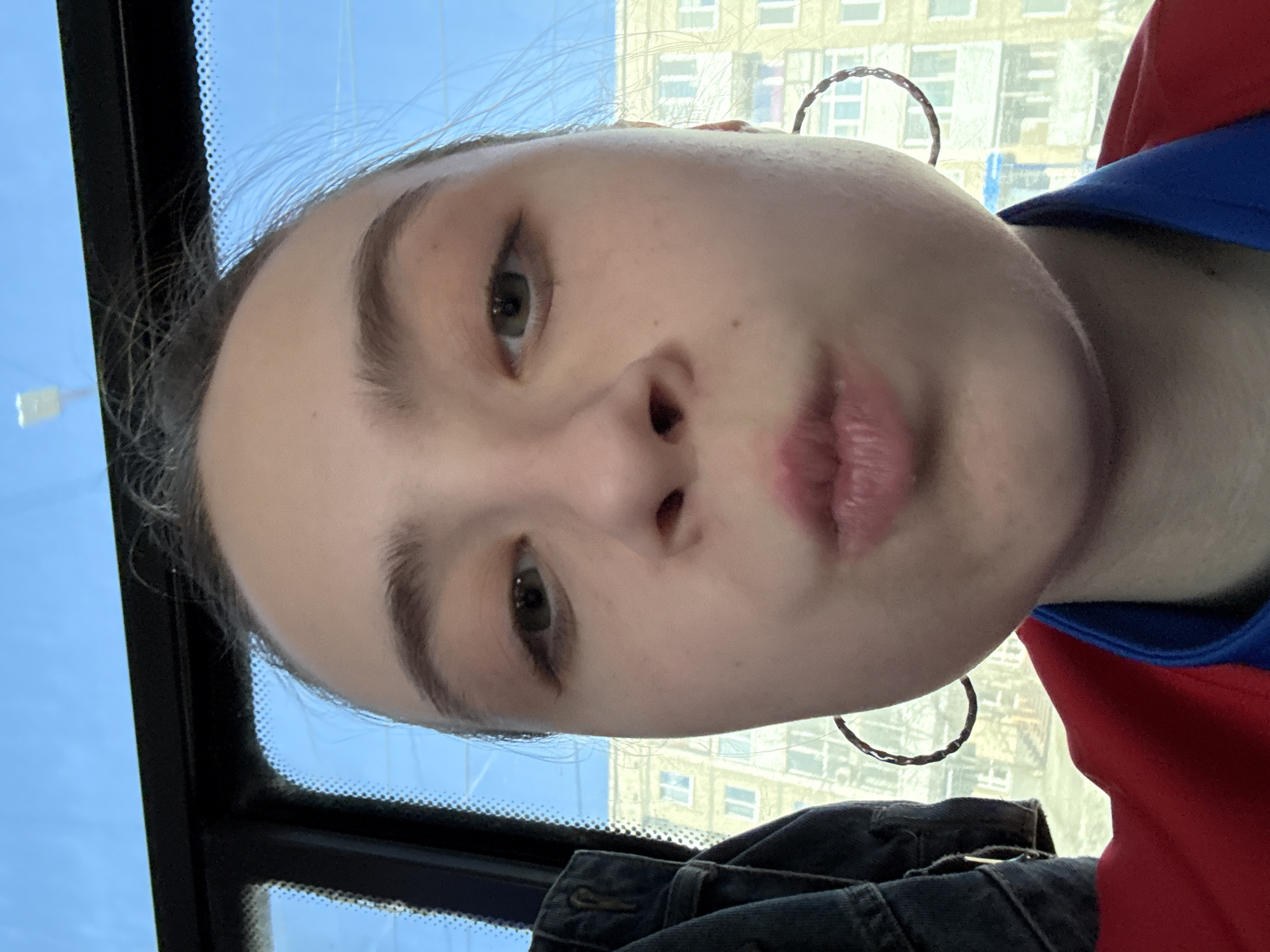 Person takes selfie inside vehicle on April 12
