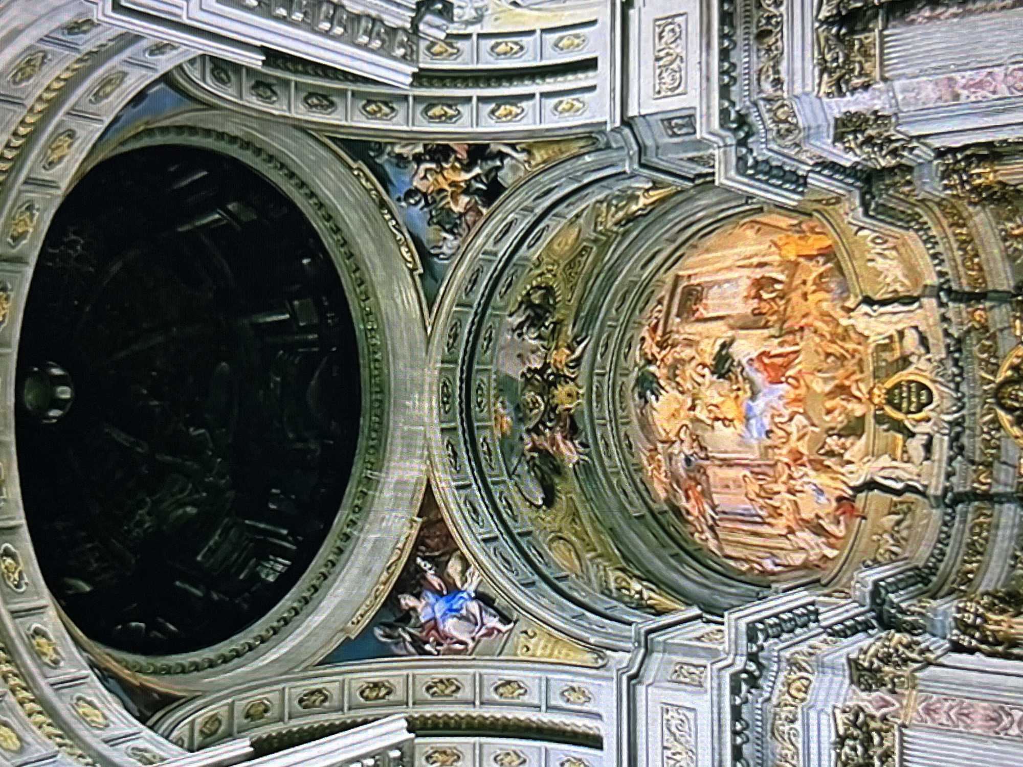 Ornate church ceiling with contrasting domes documented in Tinaquillo