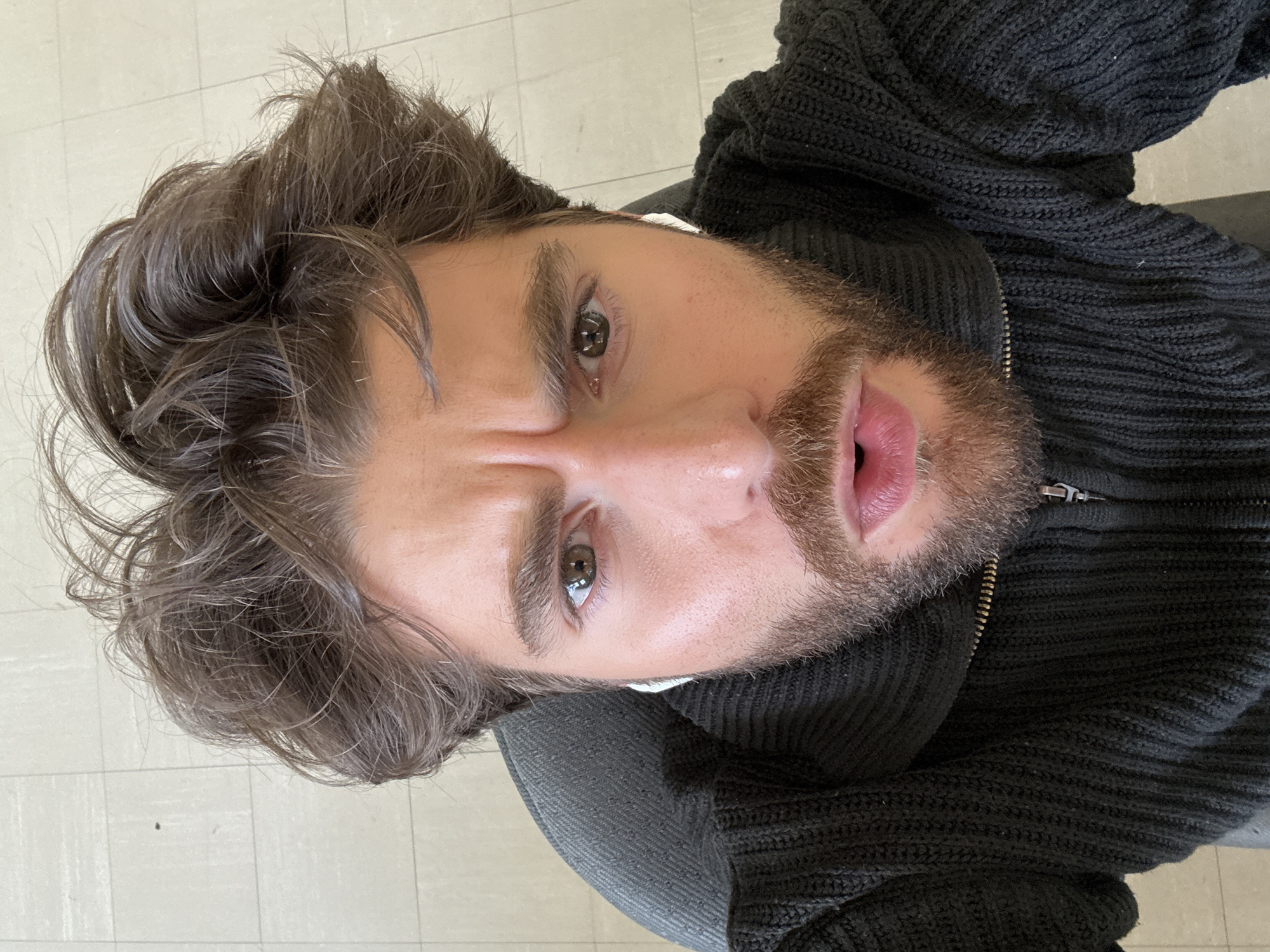 Man photographed taking selfie indoors in Montreal