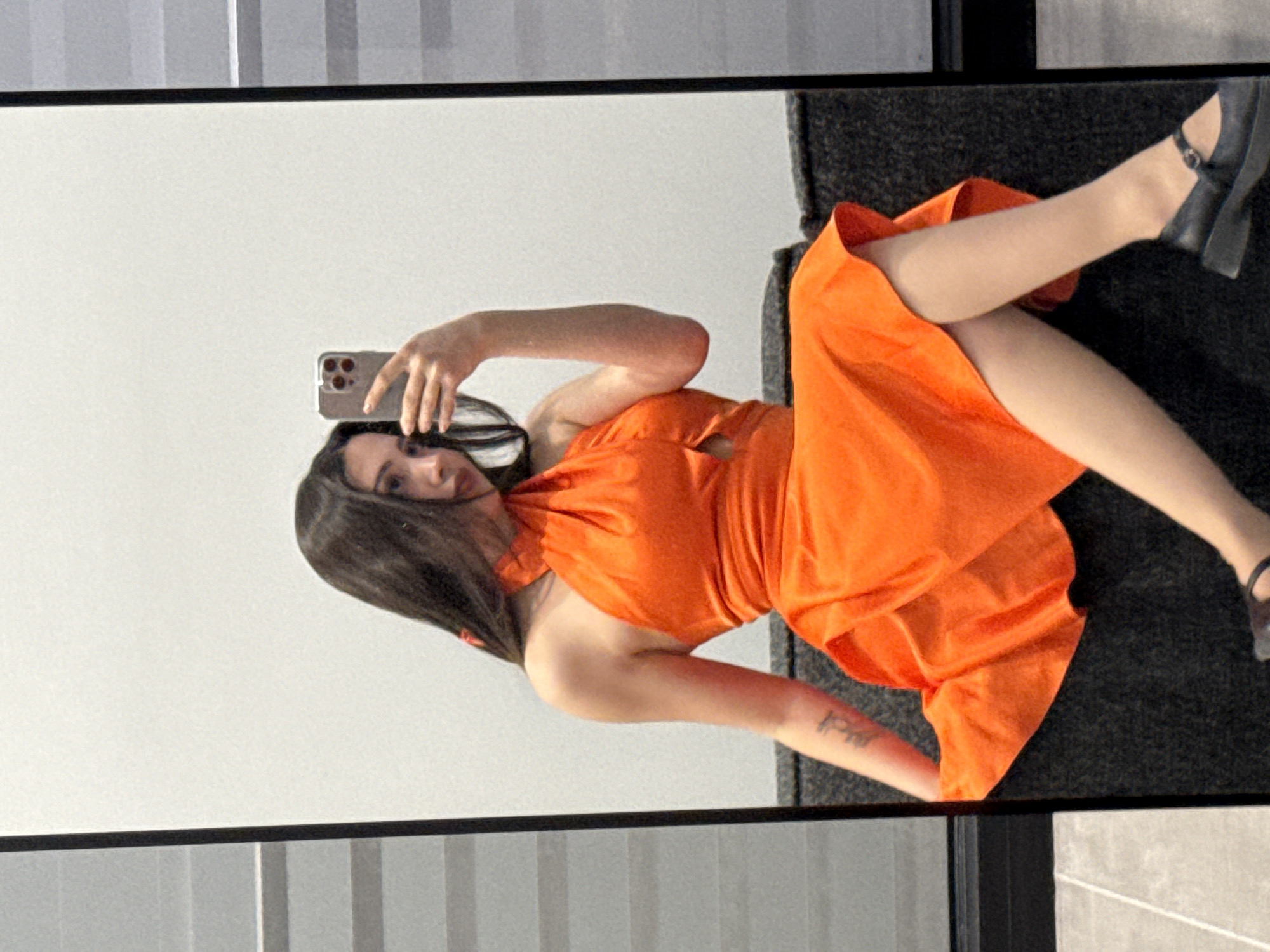 Woman takes mirror selfie in Yerevan, Armenia