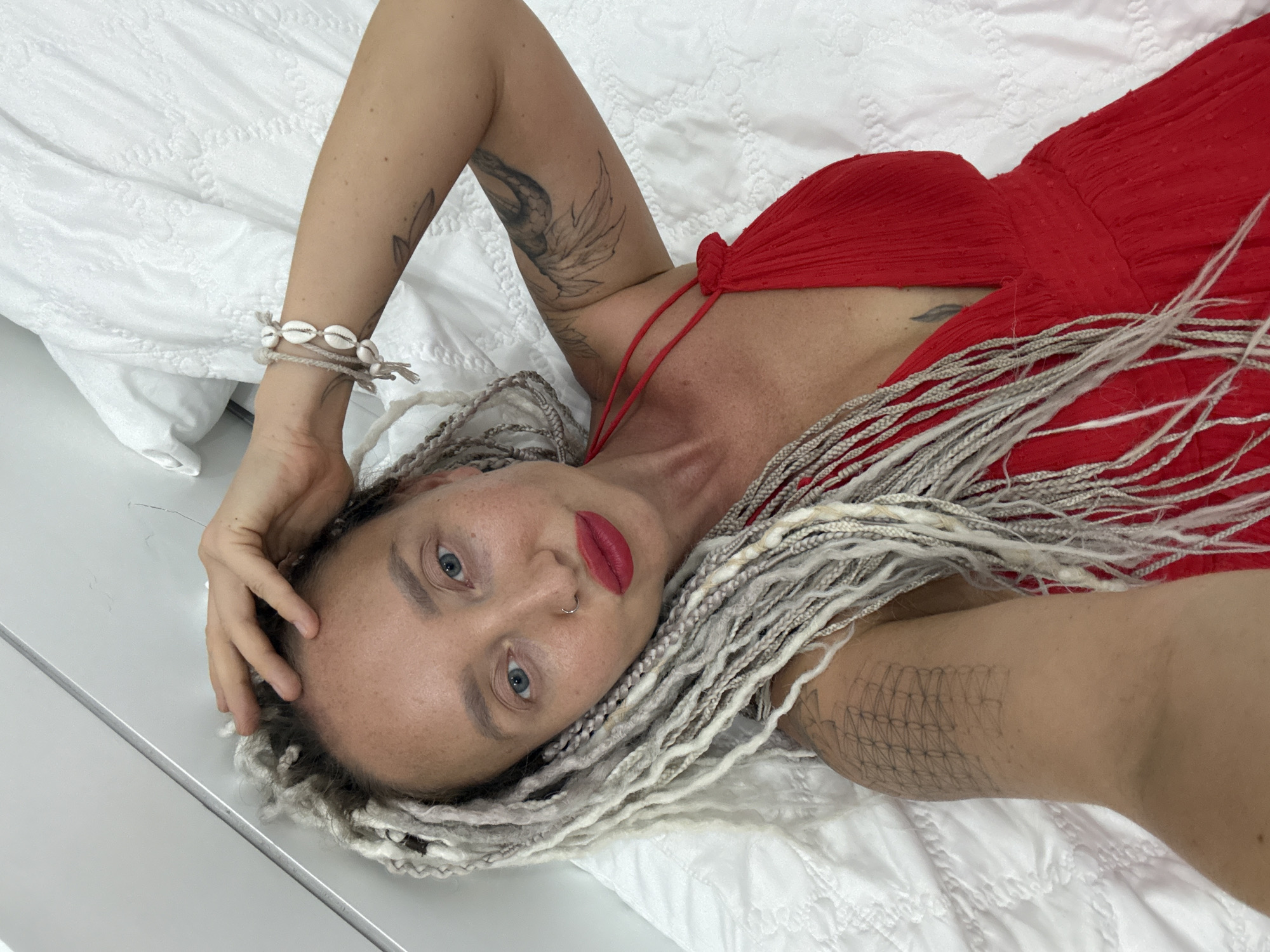 Bedroom selfie session in Nha Trang with a small dog