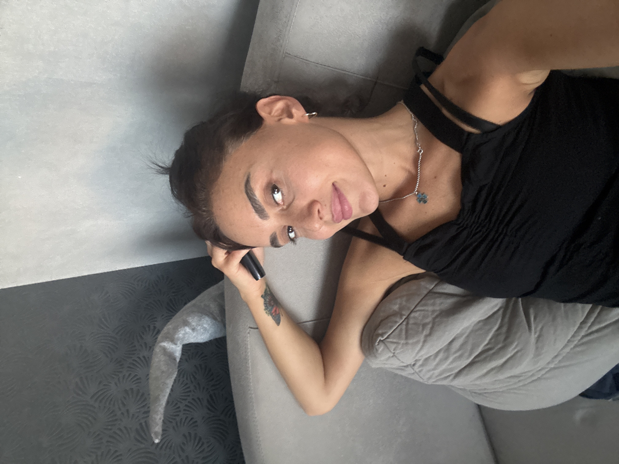 Casual selfie session on a Tbilisi apartment sofa