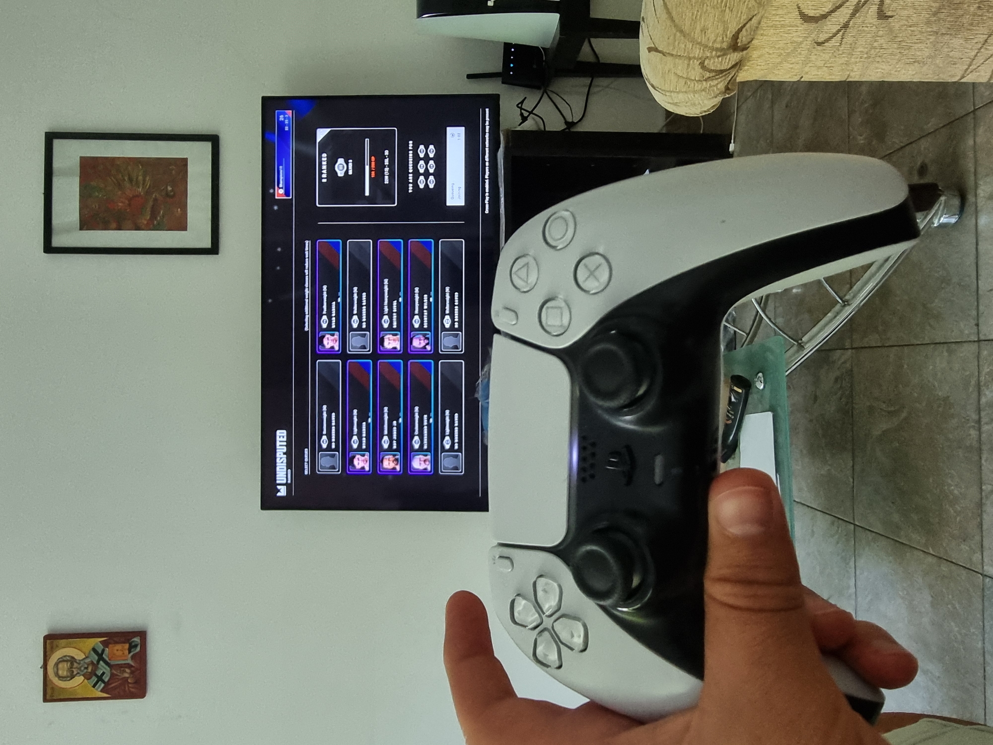 Playing Undisputed boxing on PS5 in a Sofia living room