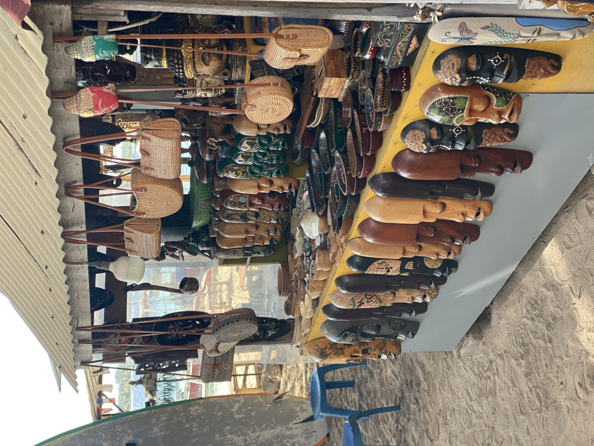 Beach bars, dive shops, and cidomo carts on the Gili Islands