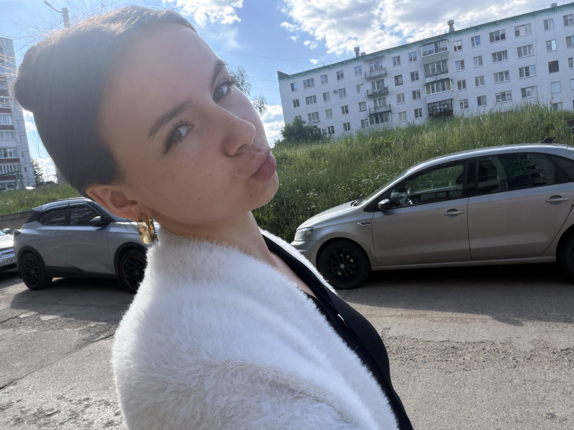 Family enjoys sunny afternoon park outing in Chaikovsky