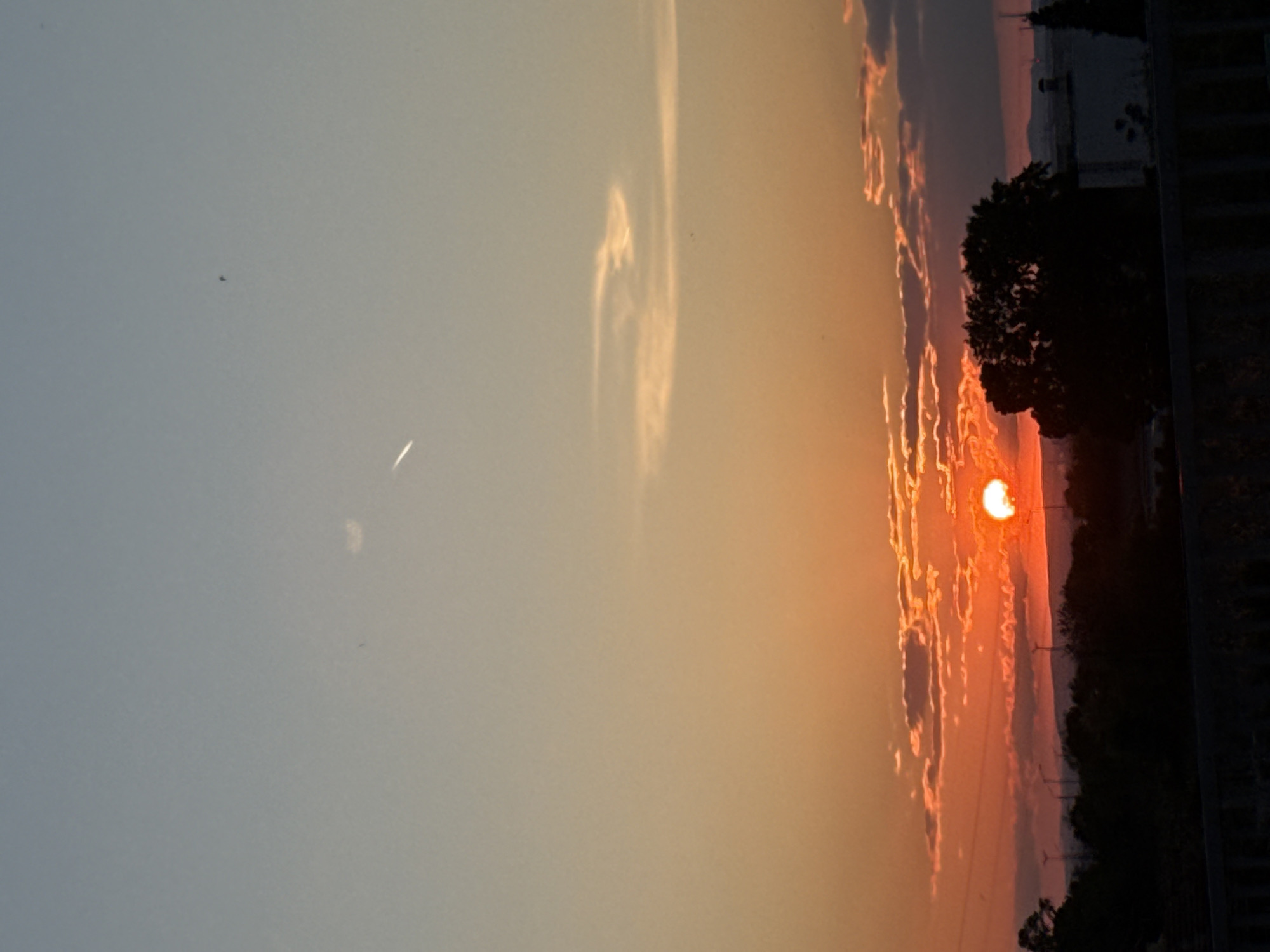 Sunset observed through clouds near Burgas, Bulgaria