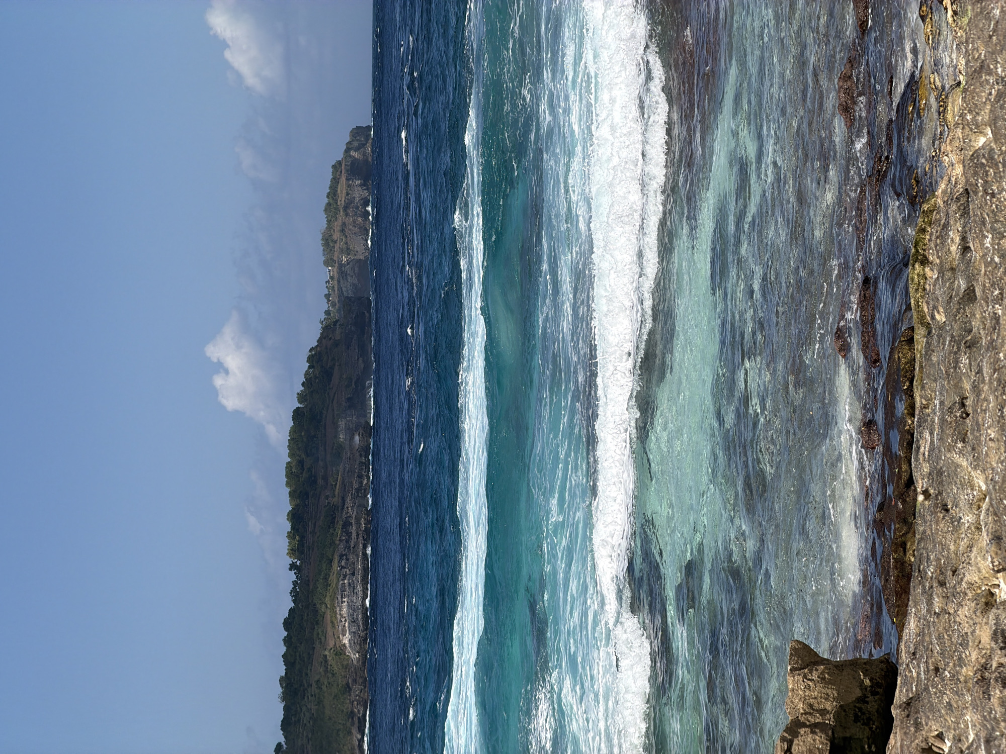 Rocky coastline beach day with portraits and ocean scenery