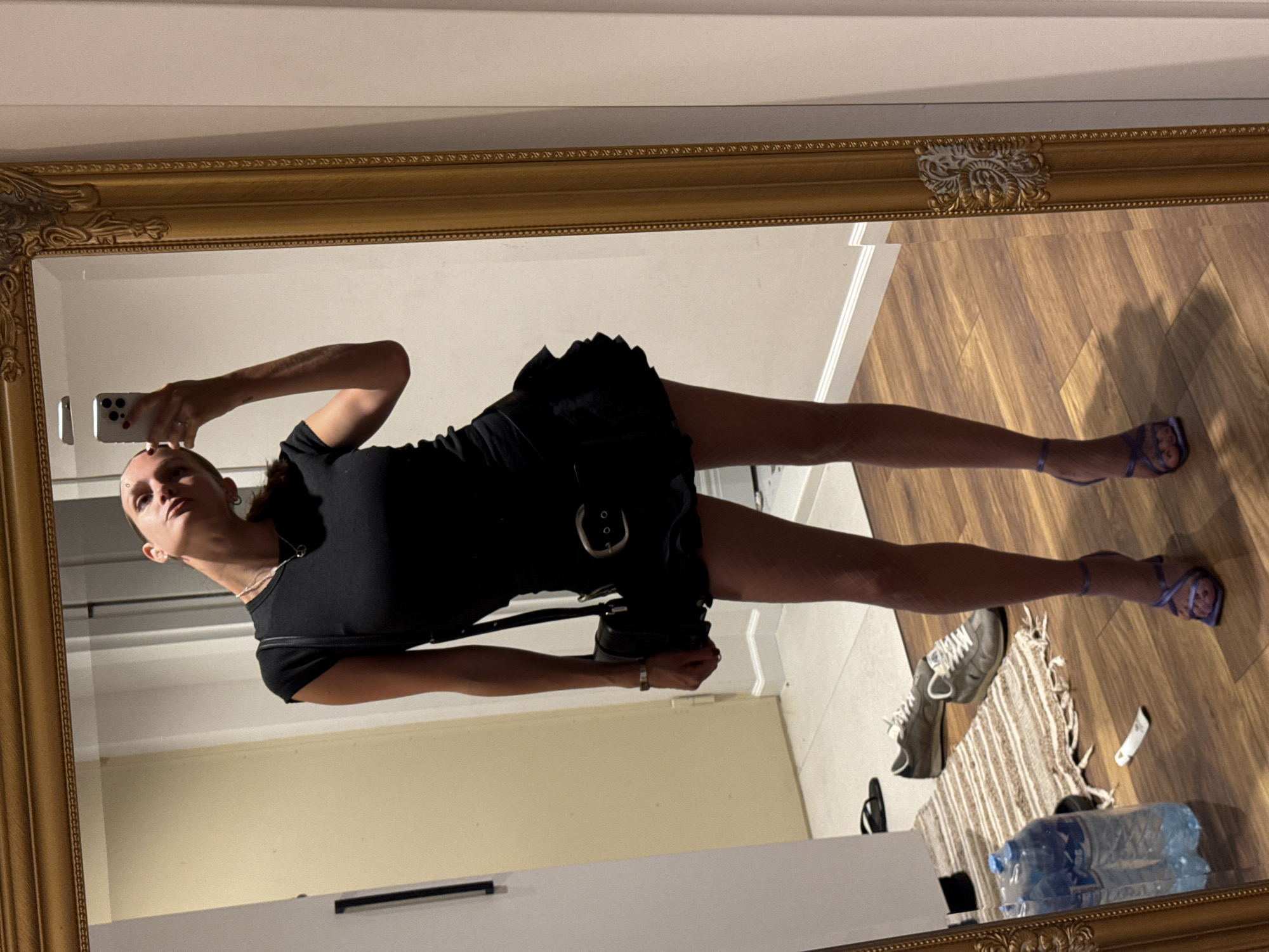 Getting dressed, mirror selfies, and a city at golden hour