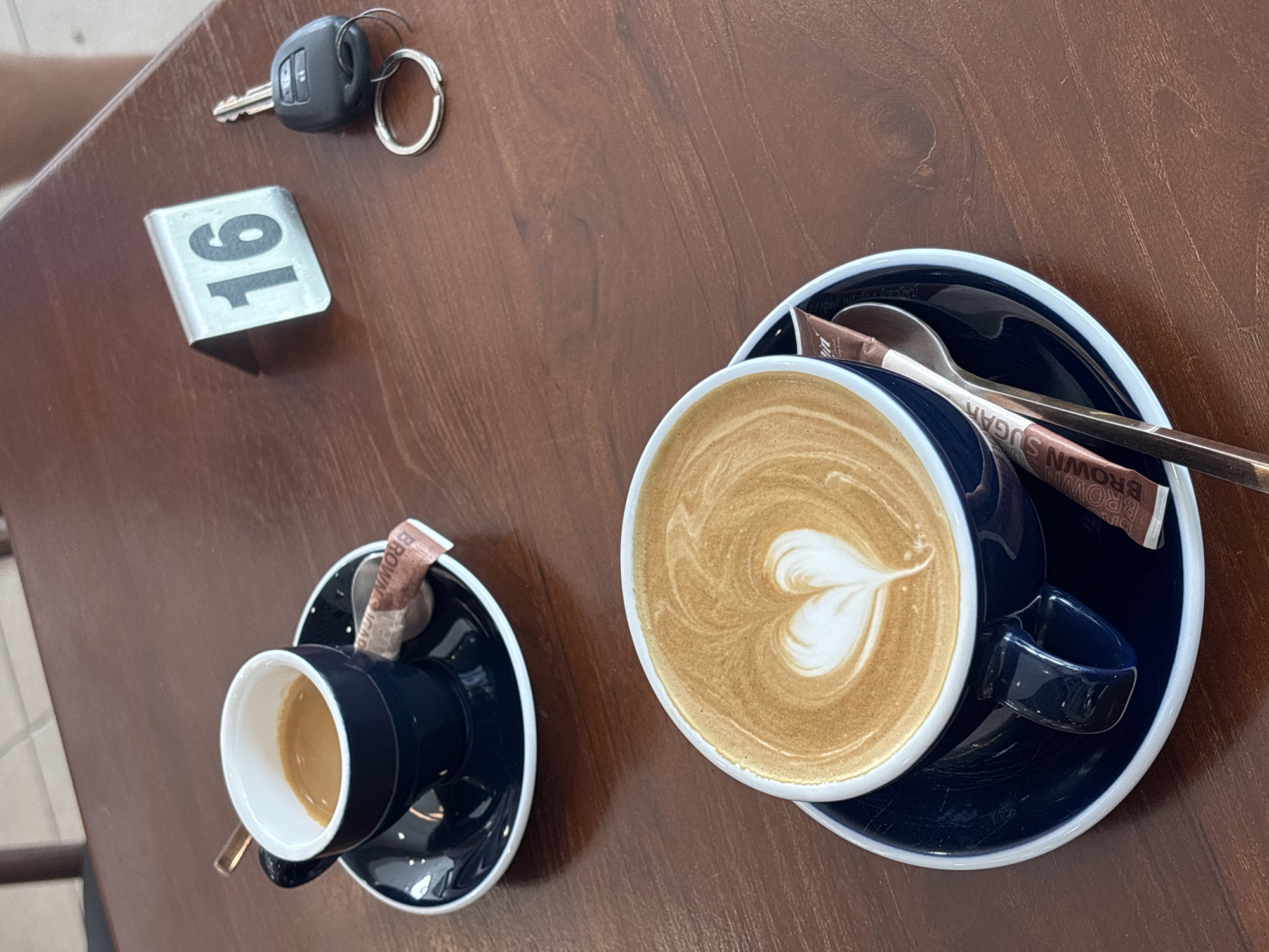 Early morning coffee break captured at Thai cafe